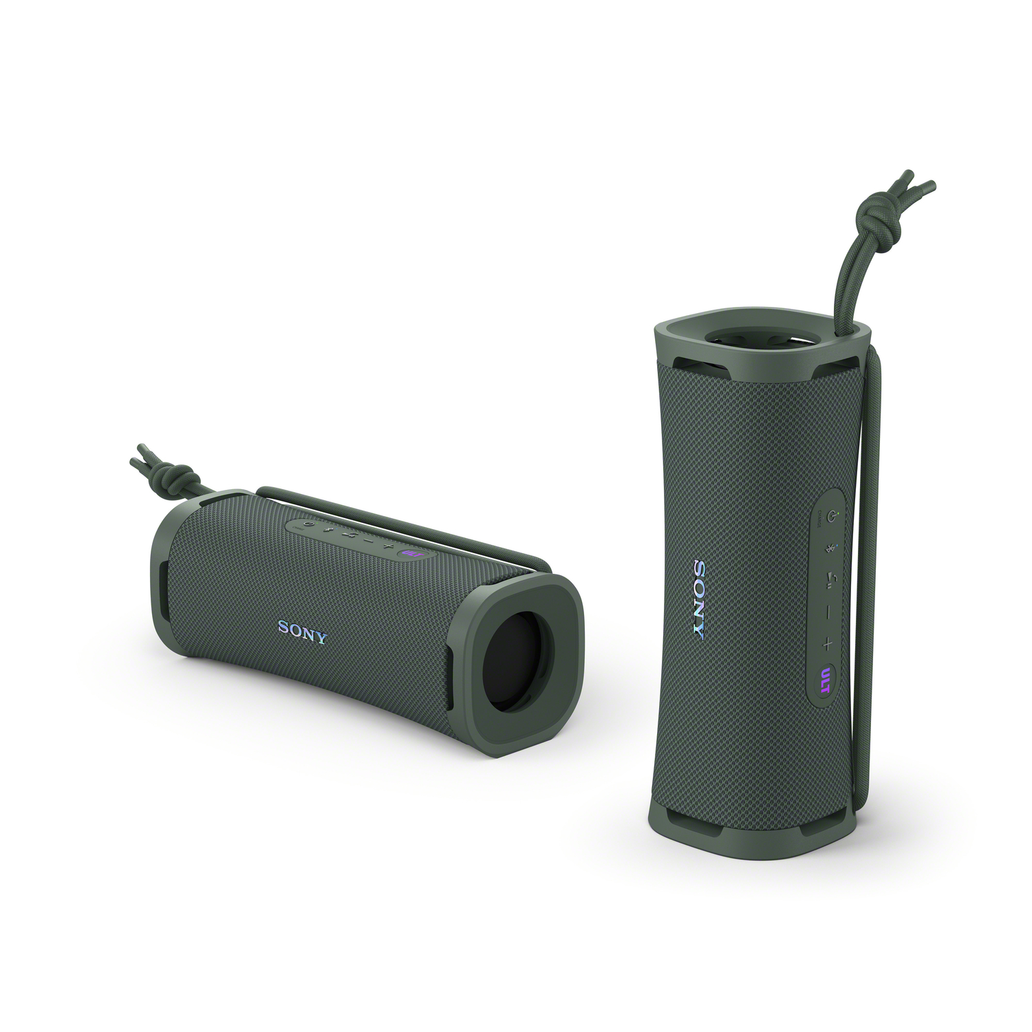 Deux enceintes cylindriques vertes avec le logo Sony, une couchée et une debout.