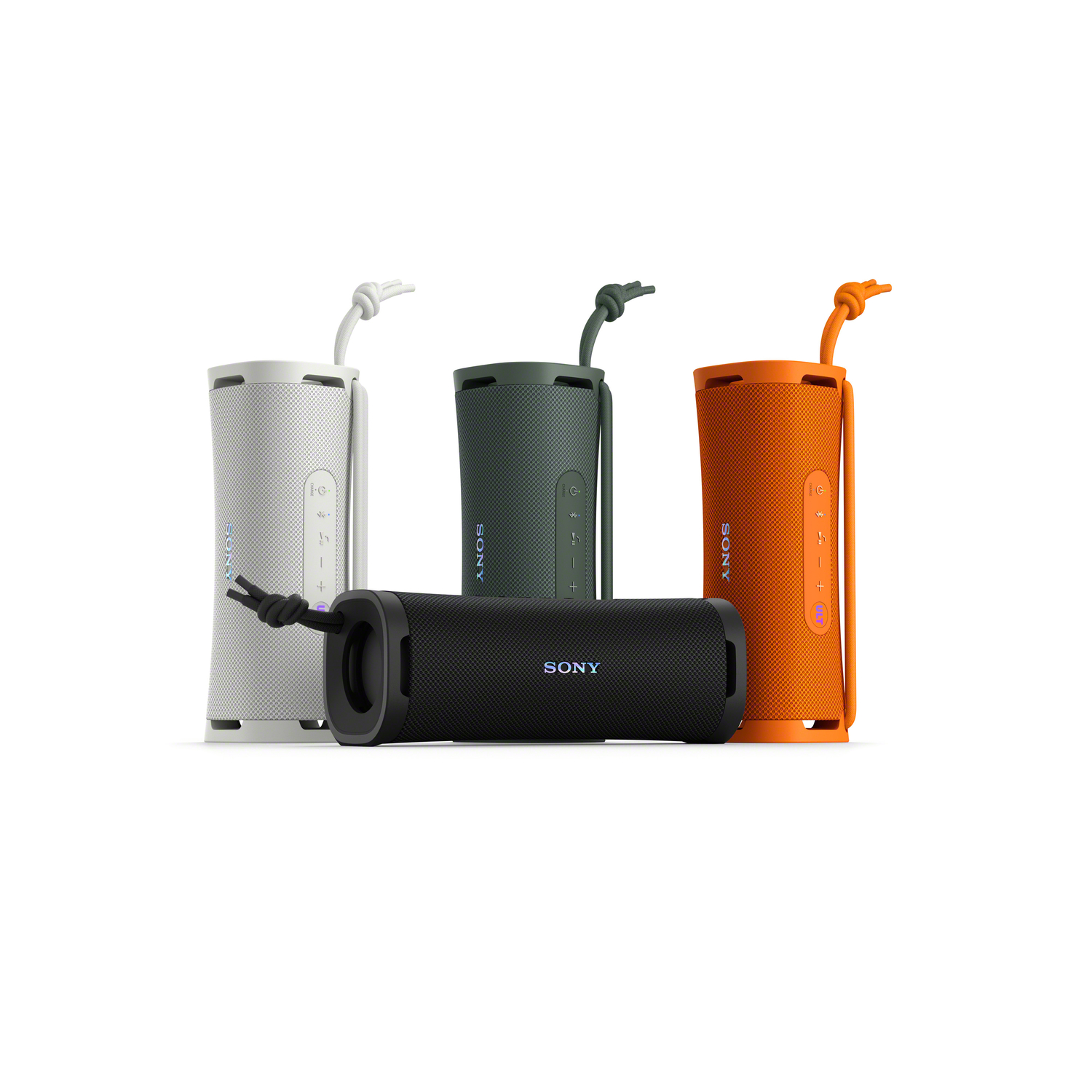 Quatre enceintes Sony cylindriques colorées sur fond blanc.