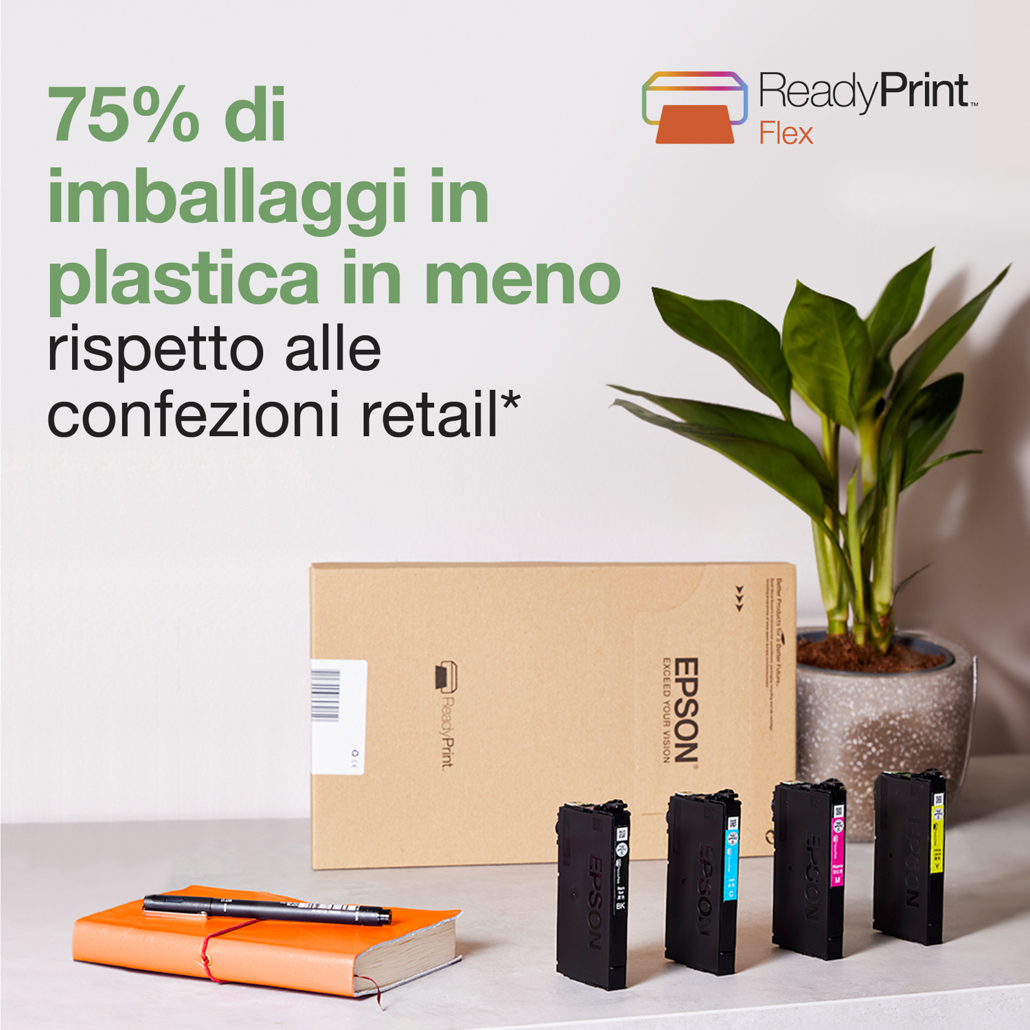Cartucce per stampanti Epson, libro, penna e una pianta in vaso su un tavolo bianco.