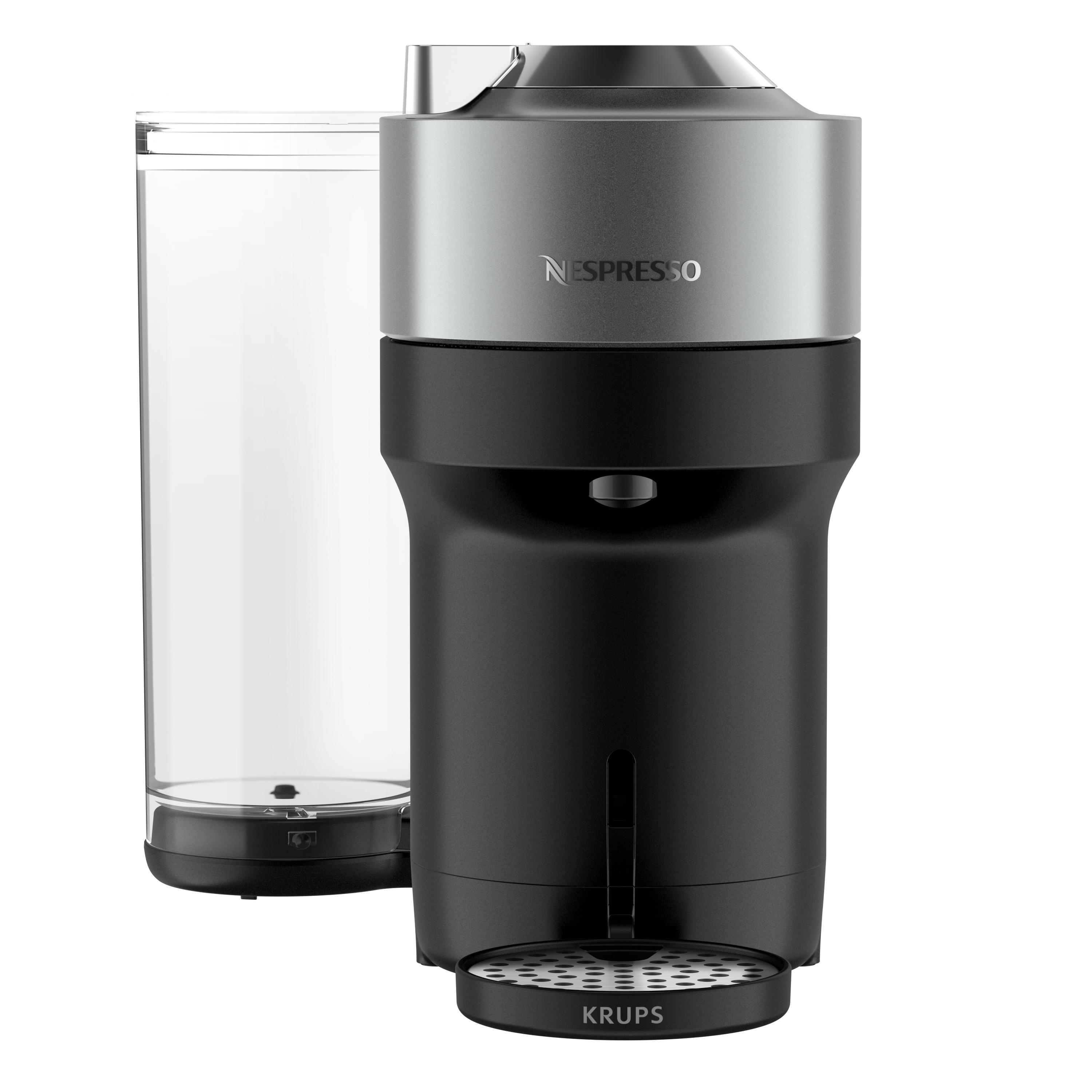 Schwarze und silberne Nespresso-Kaffeemaschine mit einem durchsichtigen Wasserbehälter.