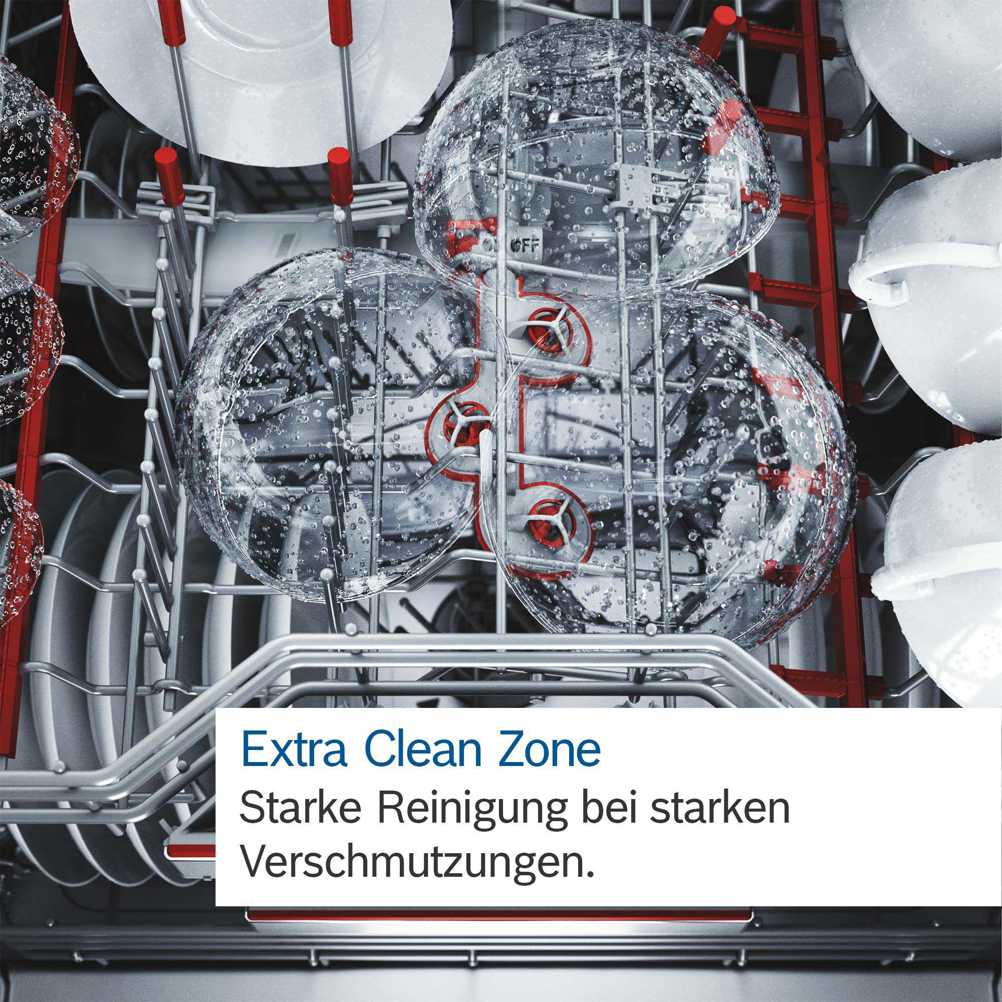 Geschirrspüler-Innenraum mit Geschirr, Schüsseln und Text: Extra Clean Zone, Starke Reinigung bei starken Verschmutzungen.