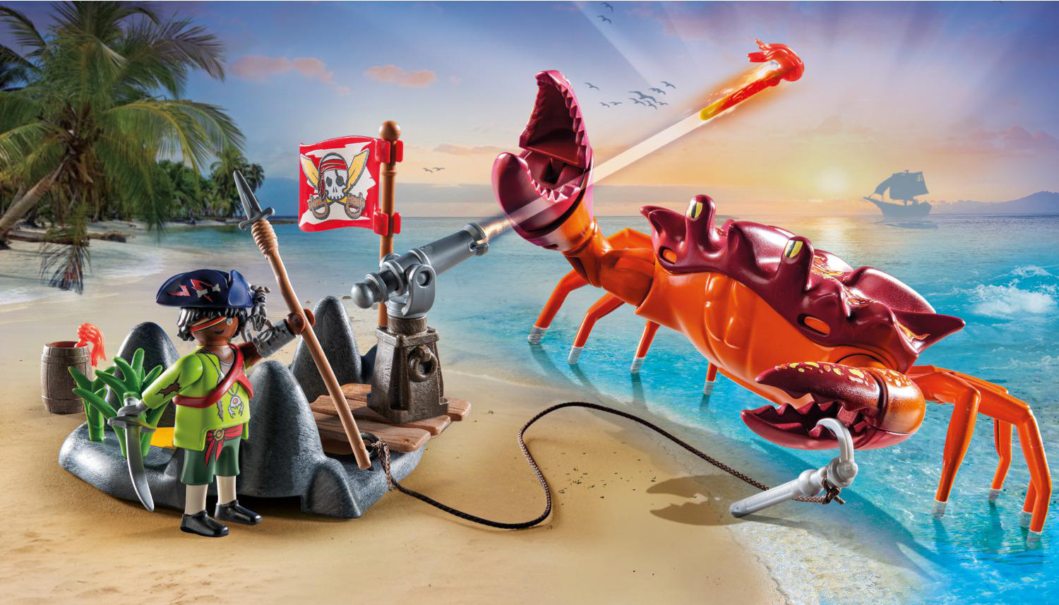 Eine Spielzeug-Piraten-Szene mit einer Kanone, die auf eine Krabbe am Strand feuert.