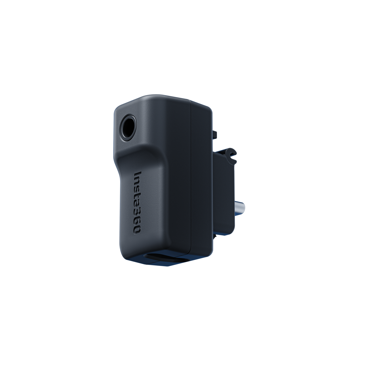 Un accessoire de caméra Insta360 noir sur fond noir. C'est un petit cube.