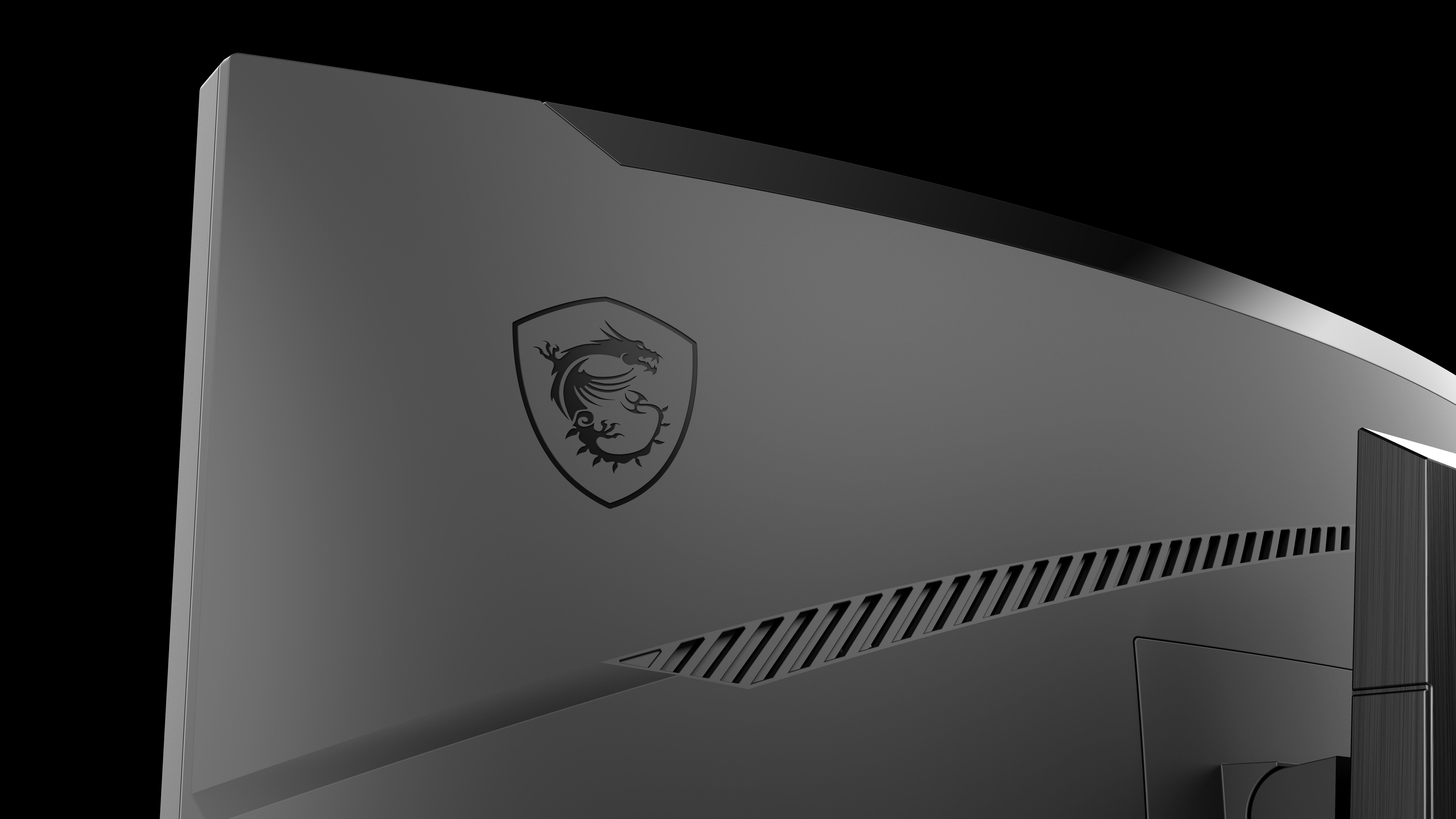 Nahaufnahme der Rückseite eines gewölbten MSI-Monitors, mit MSI-Logo und Lüftungsdetails, schwarz.