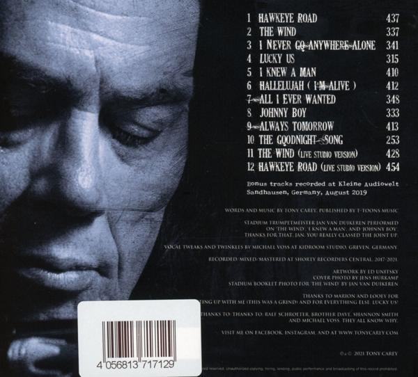 CD-Cover mit Schwarz-Weiß-Bild eines Mannes und Trackliste mit Bonustracks.
