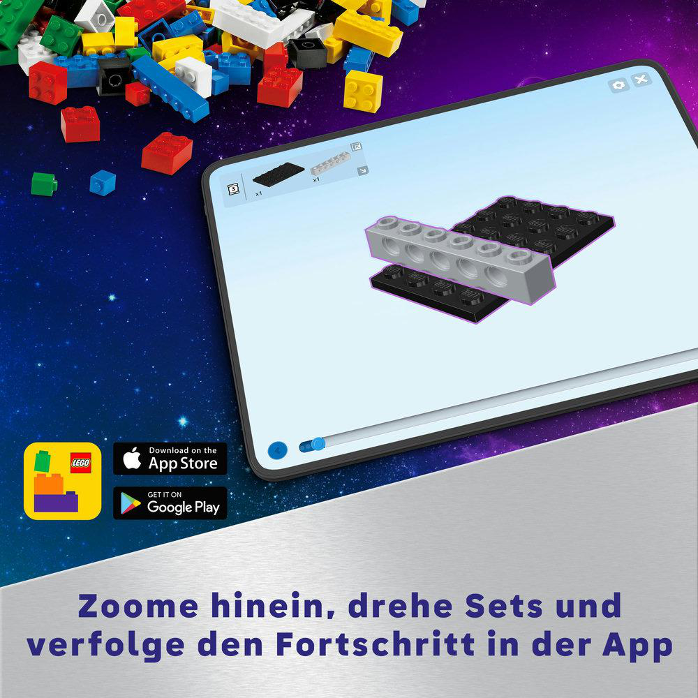 Tablet zeigt Lego-Anweisungen. Verstreute Lego-Steine sind im Hintergrund sichtbar.