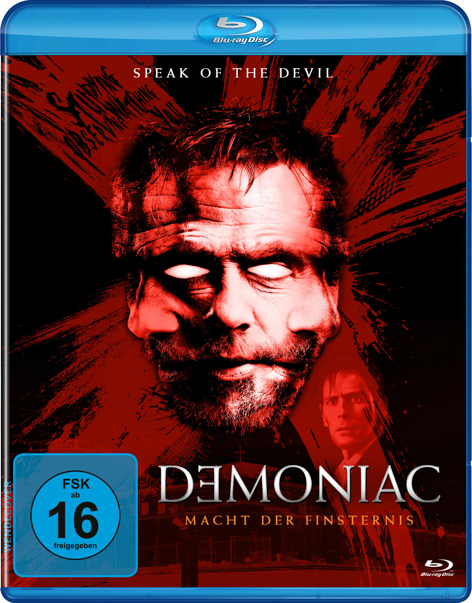 Blu-ray-Cover: Demoniac. Ein verzerrtes Gesicht, mit einem Mann im Anzug unten. Dunkelroter Hintergrund.