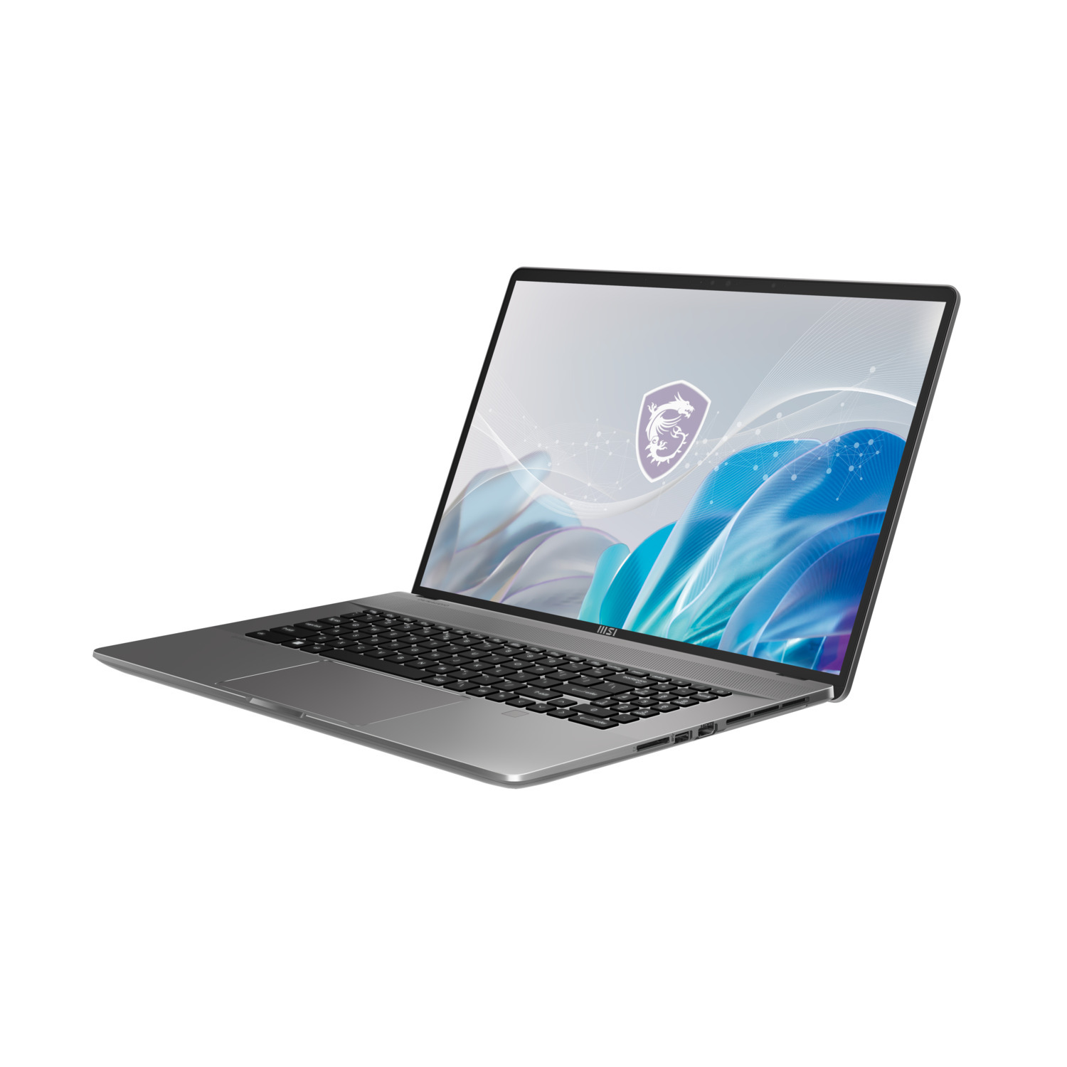 Un ordinateur portable argenté, ouvert sur une surface blanche, avec un logo sur le dessus et un écran affichant du bleu.
