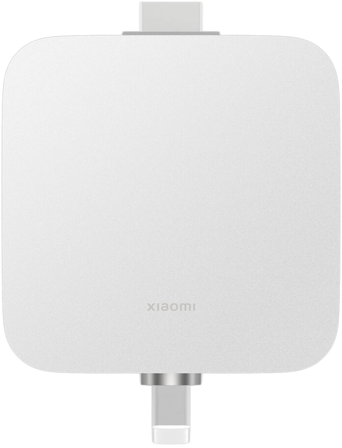 Fehér Xiaomi eszköz. Fehér felülete és szürke csatlakozója van. Felülnézet.
