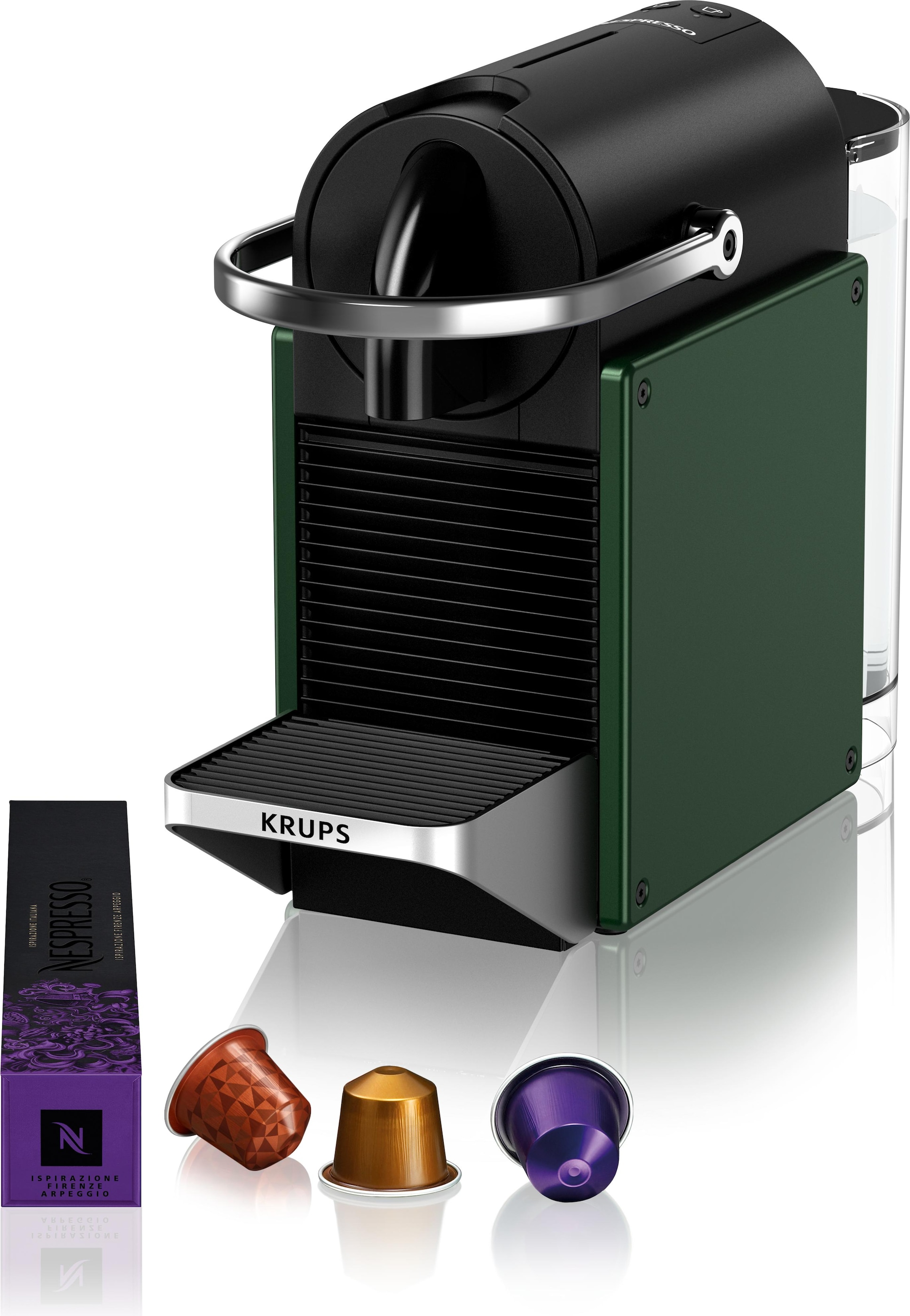 Egy zöld-fekete Nespresso gép, három kávékapszulával és egy kávésdobozzal fehér felületen.