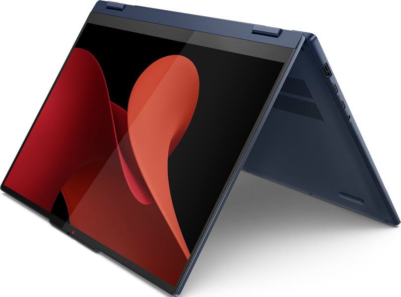 Dunkelblauer Laptop, geöffnet mit rotem, geschwungenem Design auf dem Bildschirm. Schwarzer Hintergrund.