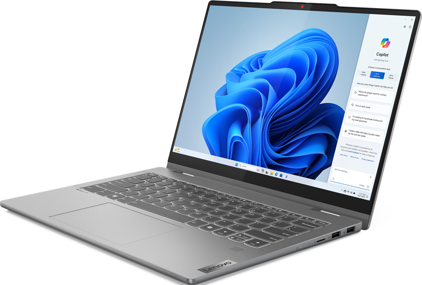 Ein silberner Laptop mit einem weißen Bildschirm, der eine Windows-Oberfläche anzeigt.
