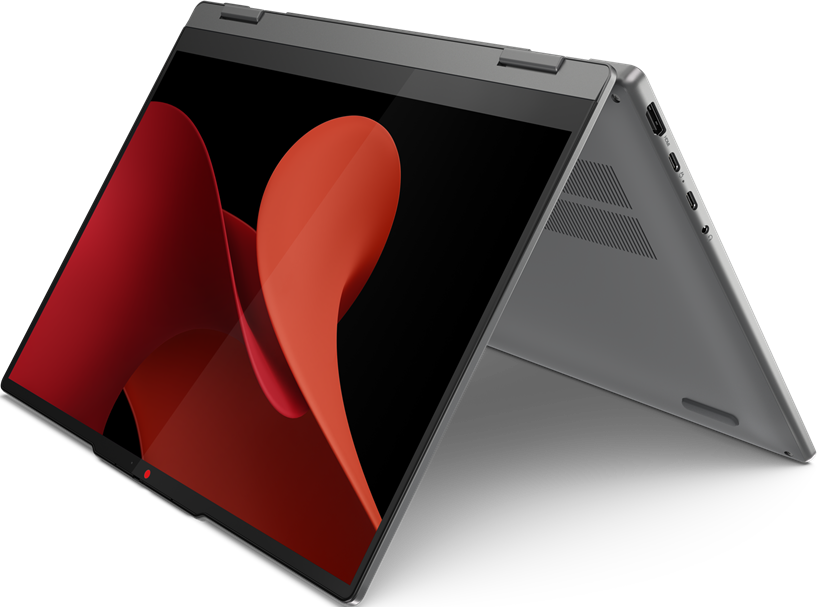 Grauer Laptop mit rotem, wirbelndem Design auf dem Bildschirm. Schwarzer Hintergrund.