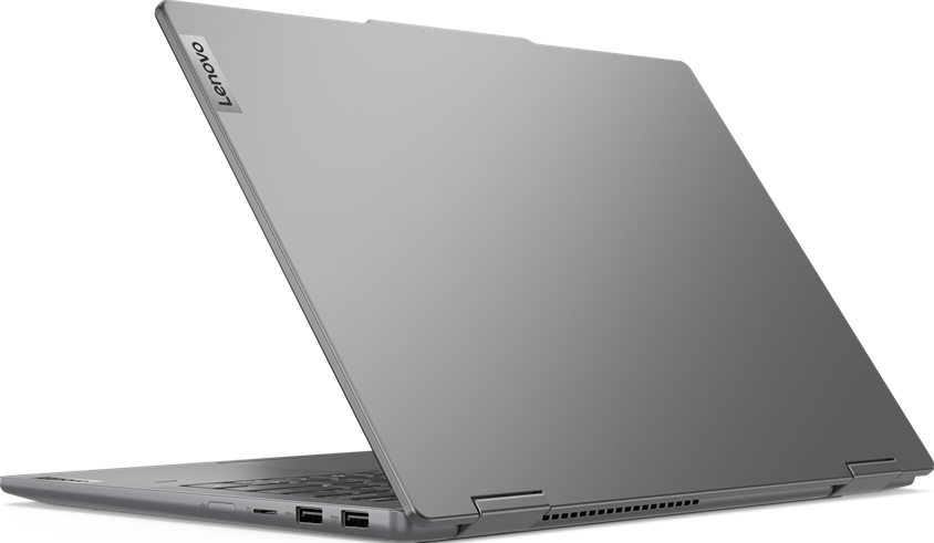 Ein silberner Laptop mit Lenovo-Logo. Der Bildschirm ist im Winkel geöffnet und zeigt die Tastatur.