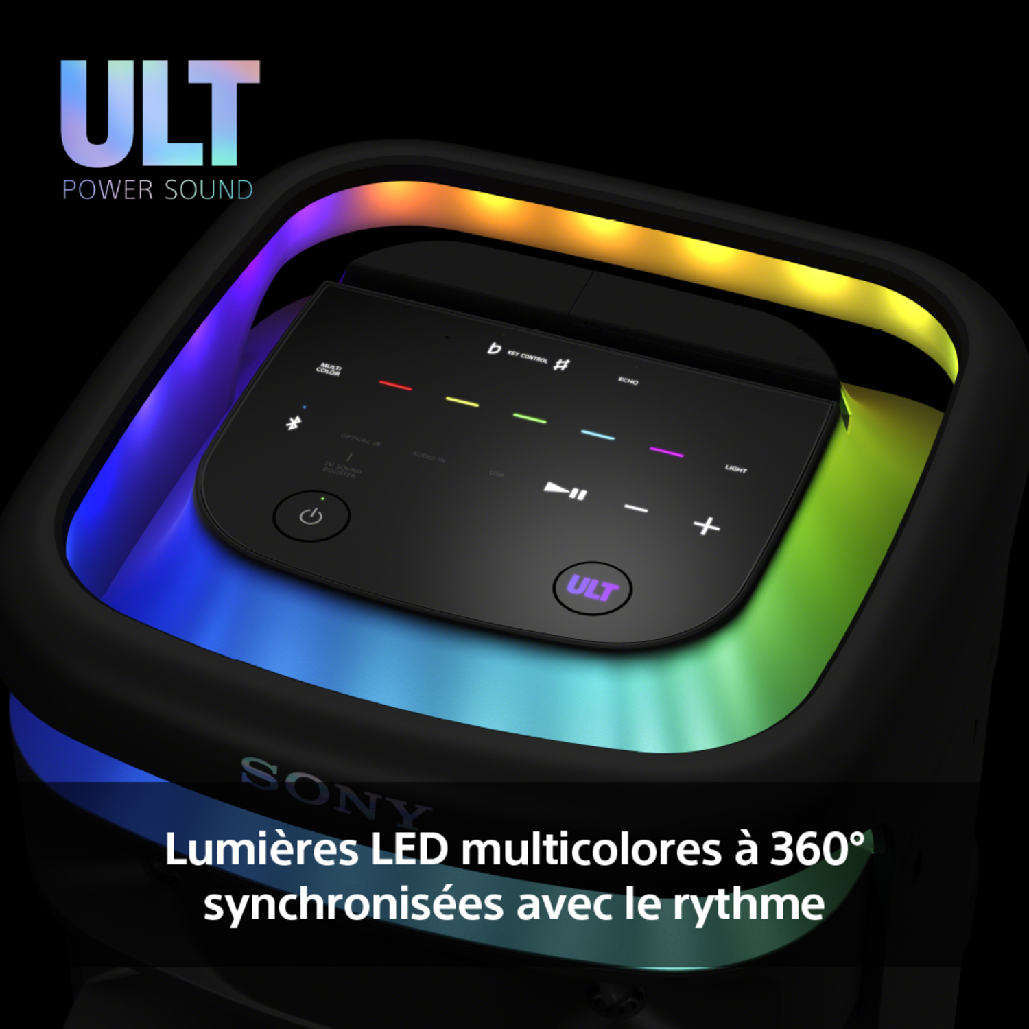 Un haut-parleur noir avec des lumières LED colorées. Un panneau de contrôle au milieu.