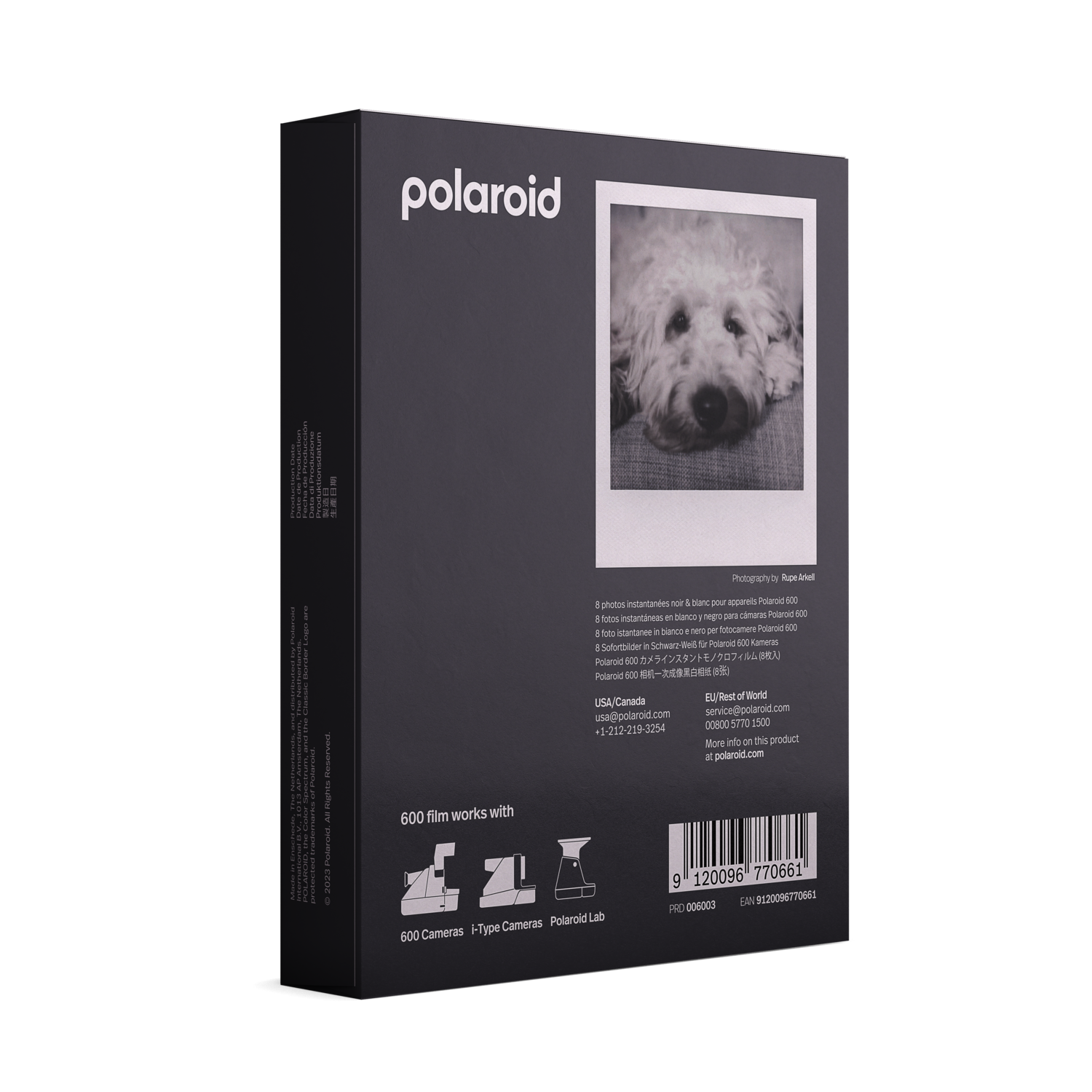 Polaroid film box with a photo of a dog on the front. White and black packaging with text.