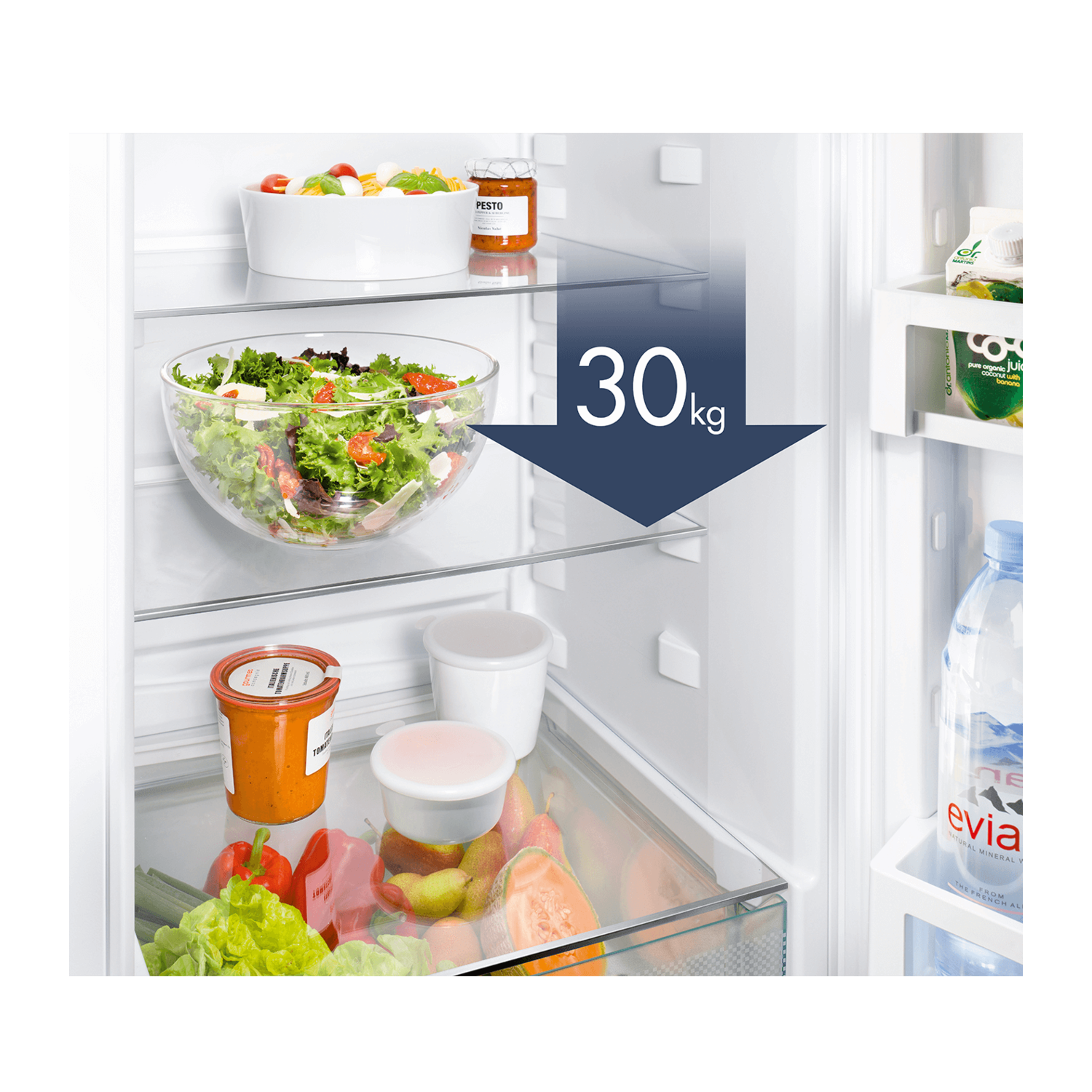 Refrigerator interior with food items, a bowl of salad, and a label of '30kg' with an arrow.