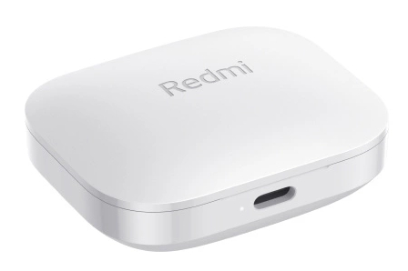 Białe, zaokrąglone prostokątne etui na słuchawki, z logo Redmi i portem ładowania.