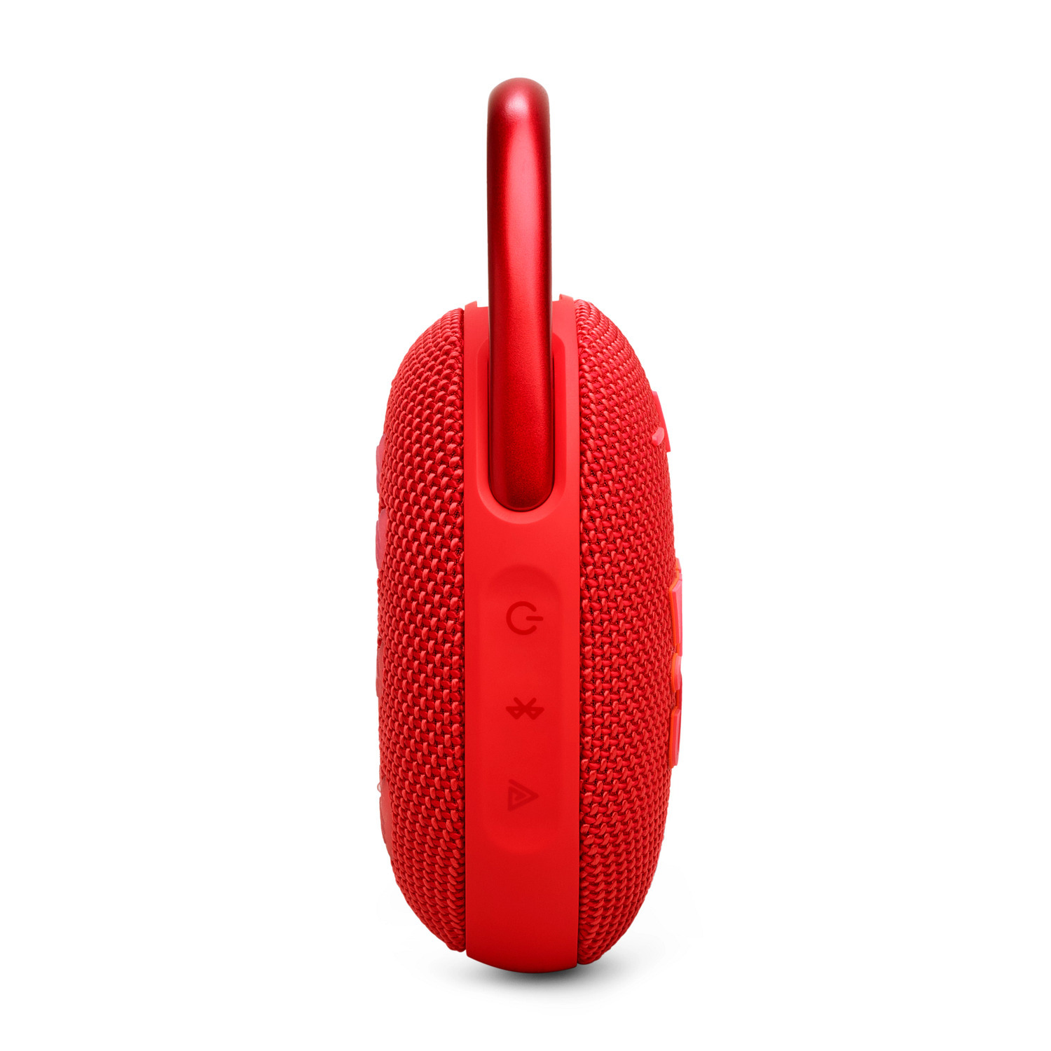 Un haut-parleur rouge portable avec une poignée de transport sur le dessus. C'est un petit appareil carré.