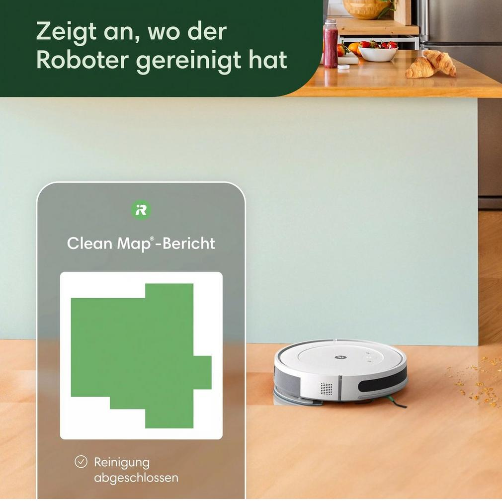 Roboter-Staubsauger mit grüner Reinigungslandkarte und Küchenarbeitsplatte im Hintergrund.