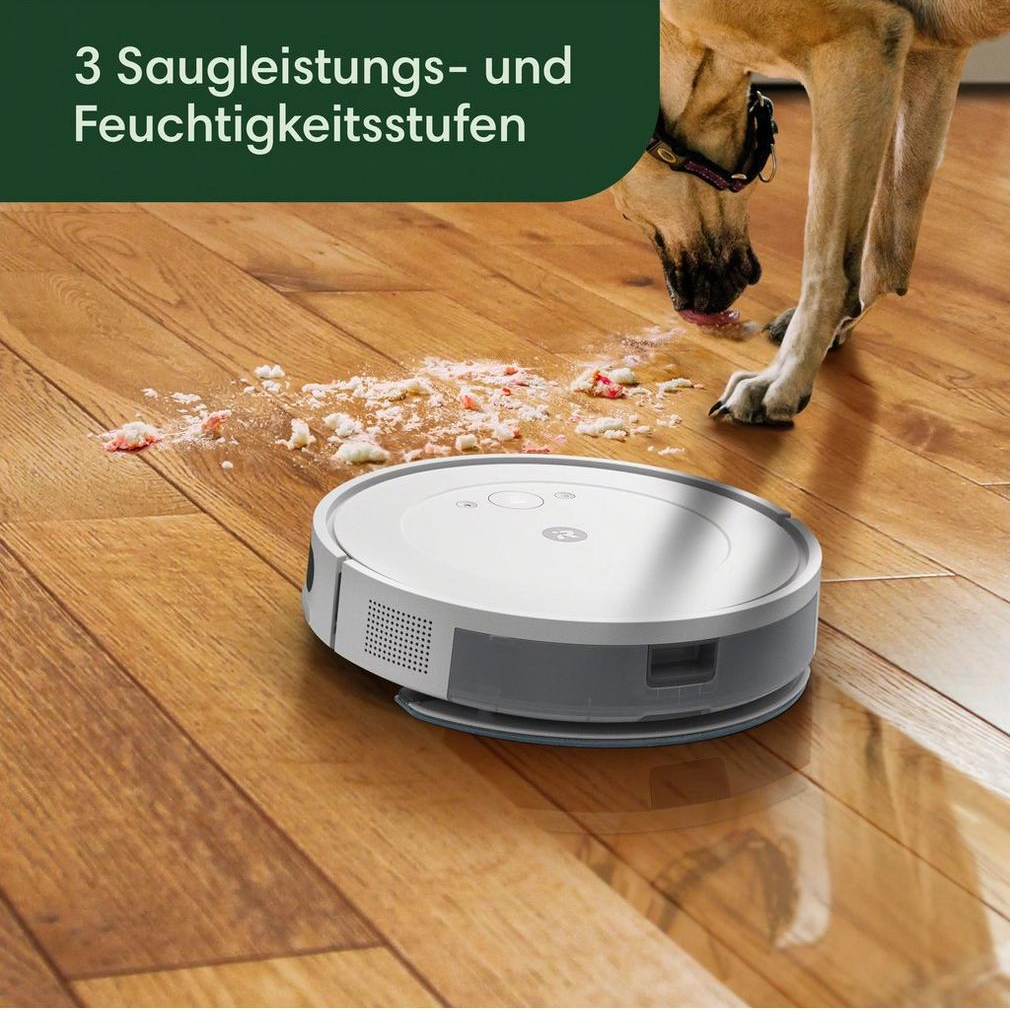Ein Roboter-Staubsauger auf einem Holzboden.