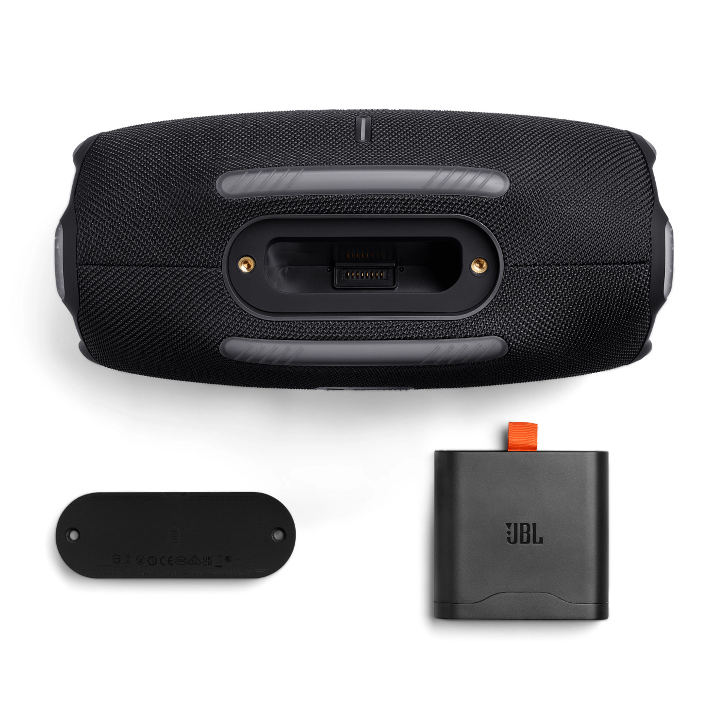 Black JBL speaker with charger. The speaker has a charging port and an orange strap.