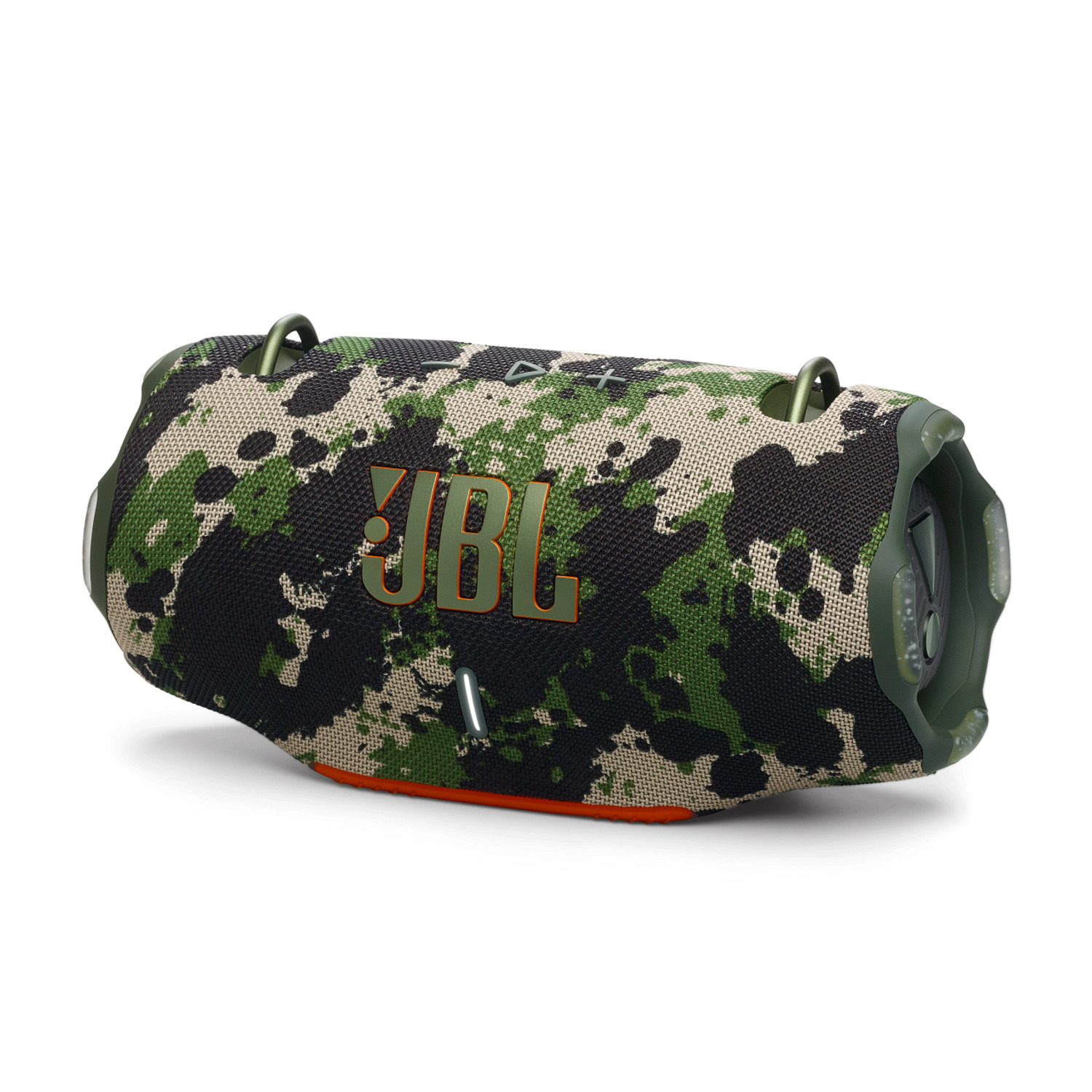 Haut-parleur JBL à motif camouflage avec accents orange, sur une surface blanche.