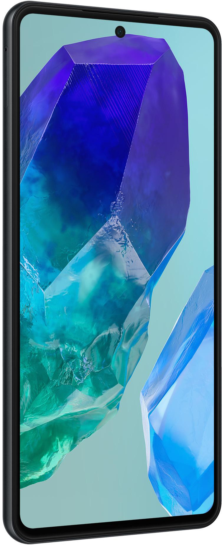 Czarny smartfon z kolorowym, abstrakcyjnym tłem, które ma jasnoniebieskie kształty.