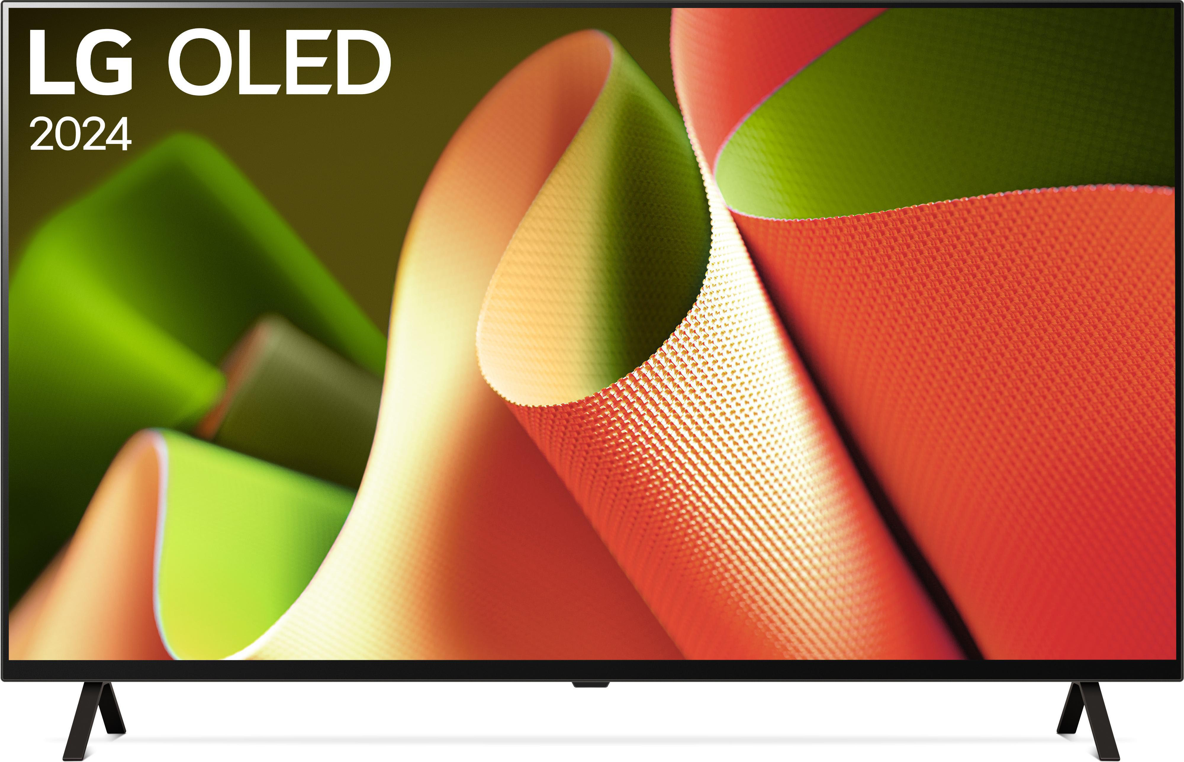 Ein LG OLED-Fernseher, schwarzer Rahmen. Der Bildschirm zeigt farbenfrohe, abstrakte Formen in Rot, Grün und Weiß.