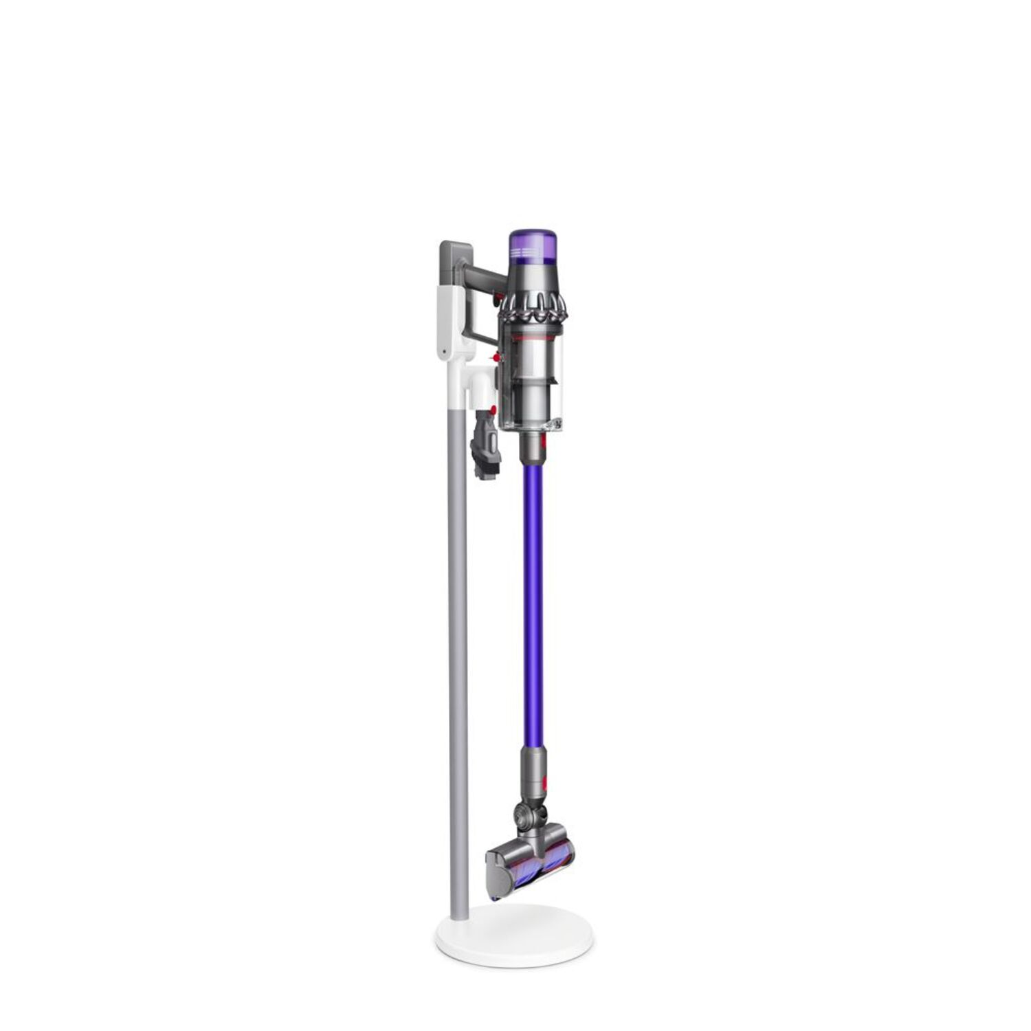 Un support d'aspirateur blanc tient un aspirateur Dyson violet et argenté.