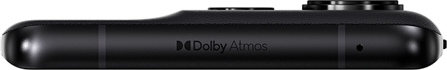 Közelkép a fekete telefon alsó széléről. Dolby Atmos logó látható.