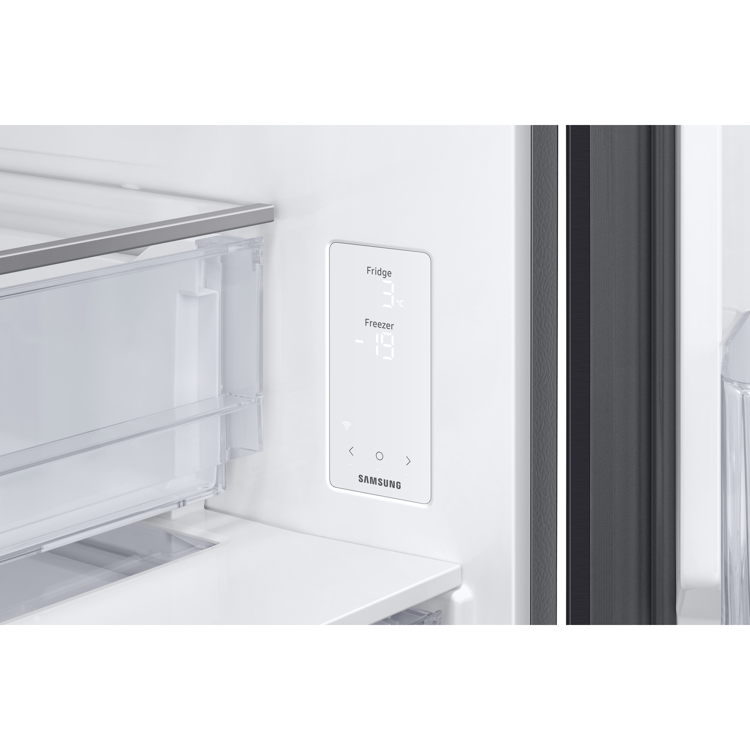 Close-up of refrigerator control panel with temperature display.