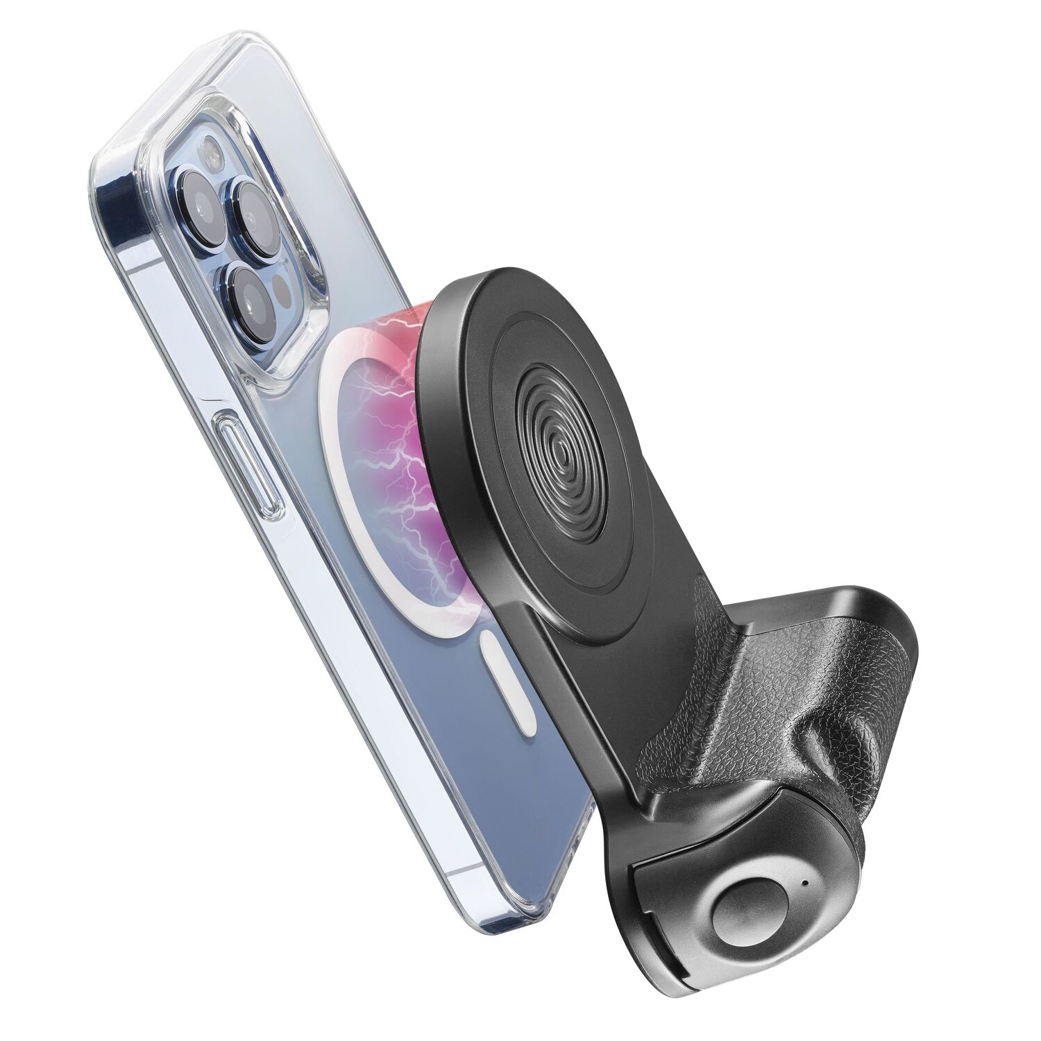 A phone in a clear case magnetically attached to a black phone holder with a round base.