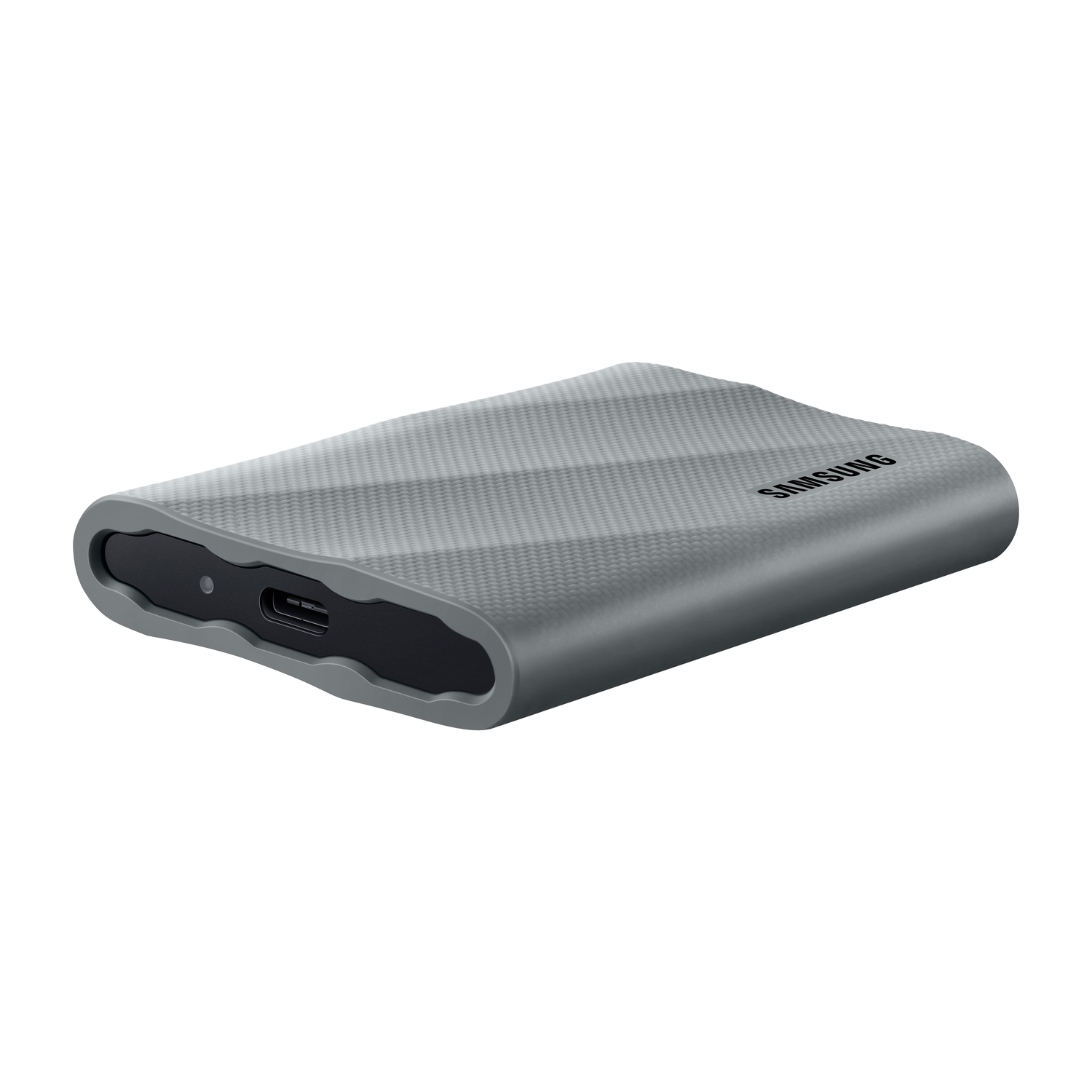 Gray, textured portable SSD, with a black USB port.