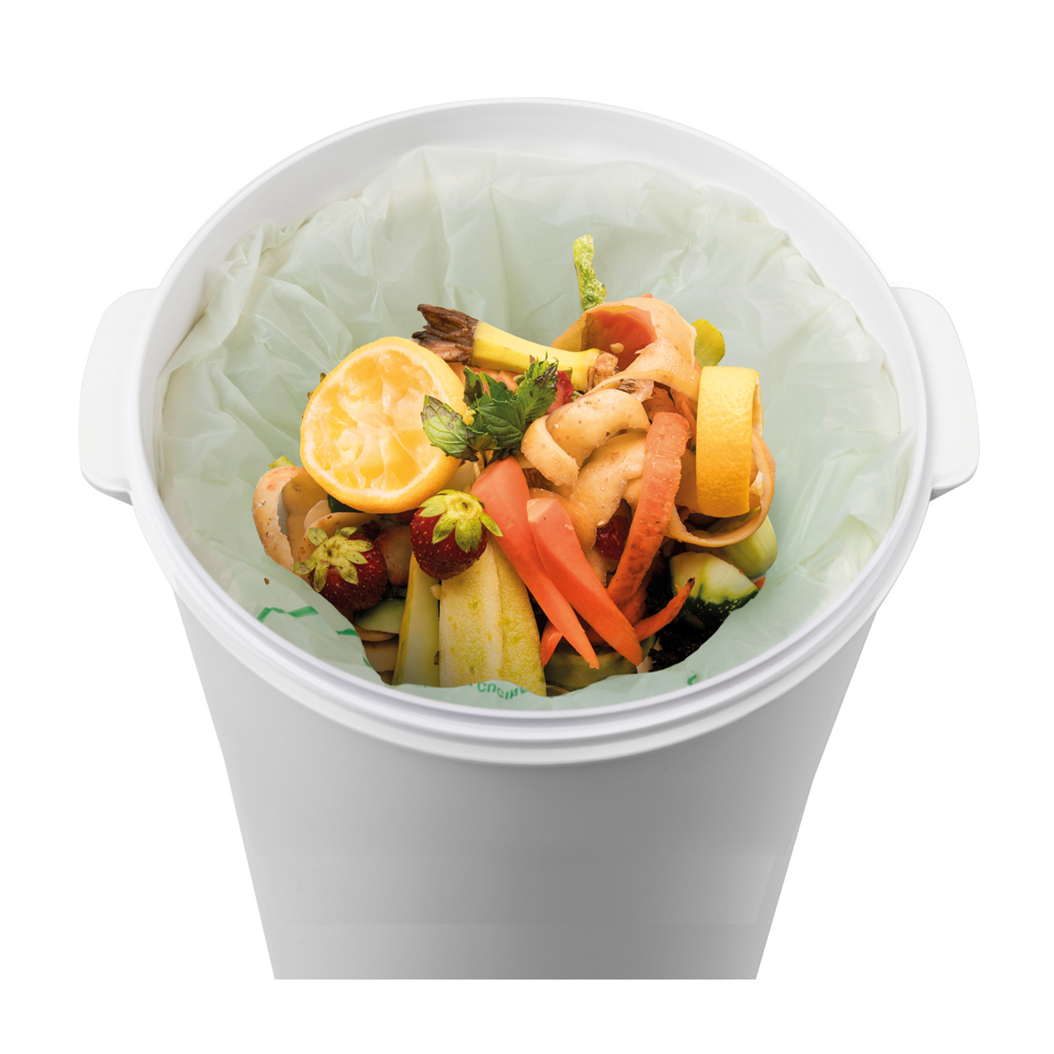 Un cestino bianco con vari rifiuti alimentari all'interno. Il cestino ha un sacchetto verde.