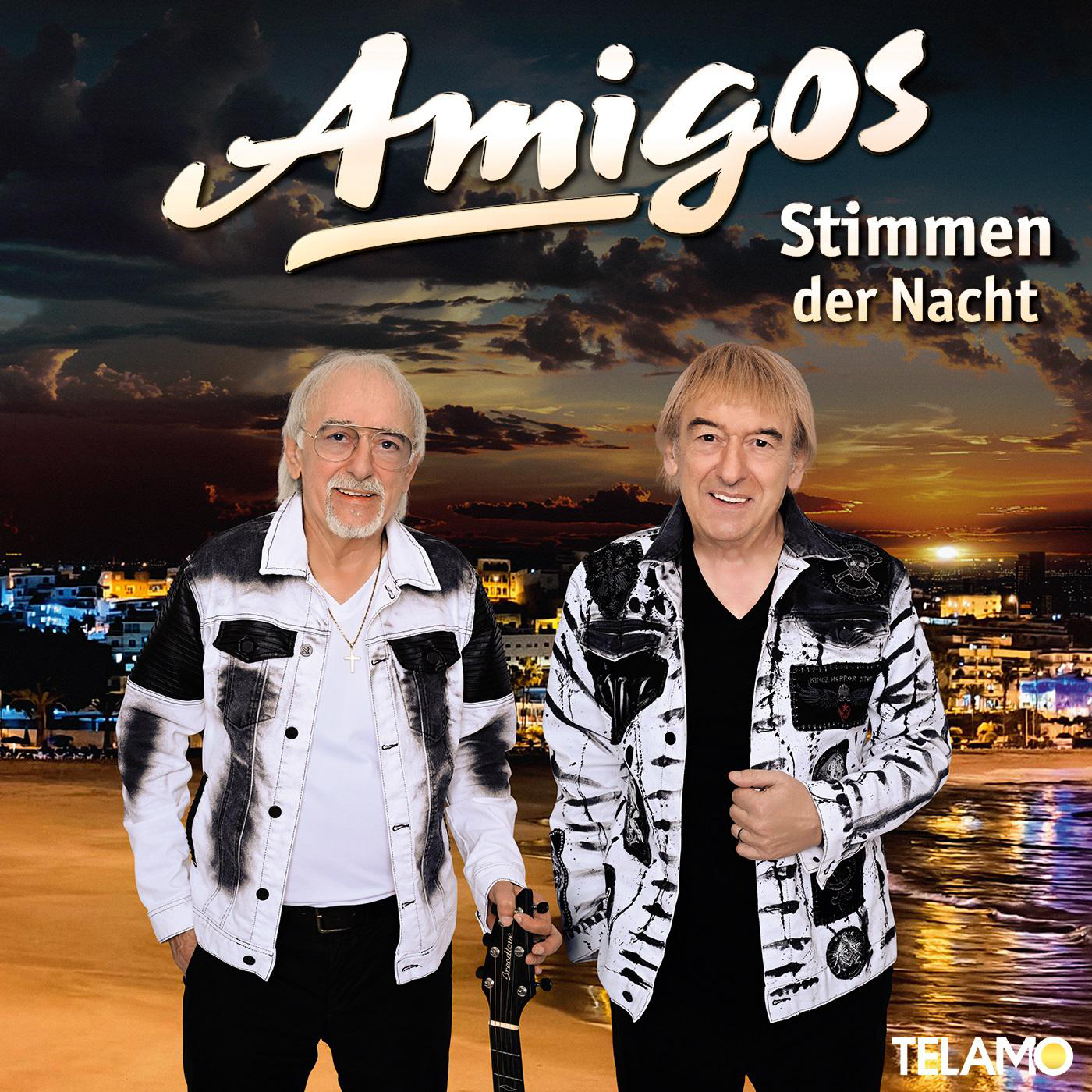 Amigos Albumcover. Zwei Männer stehen vor Strandhintergrund. Albumtitel oben.
