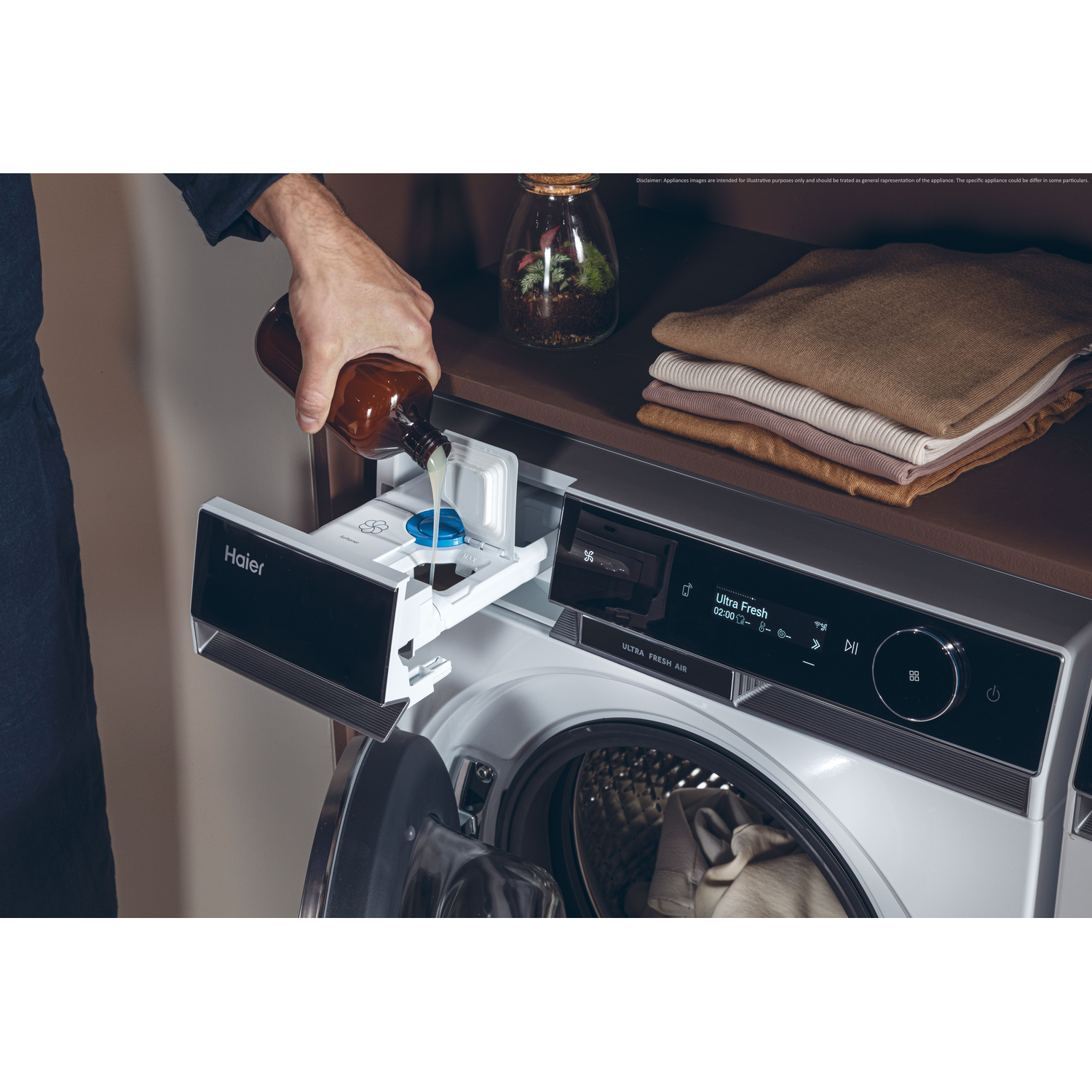 A person pouring liquid detergent into a Haier washing machine dispenser.