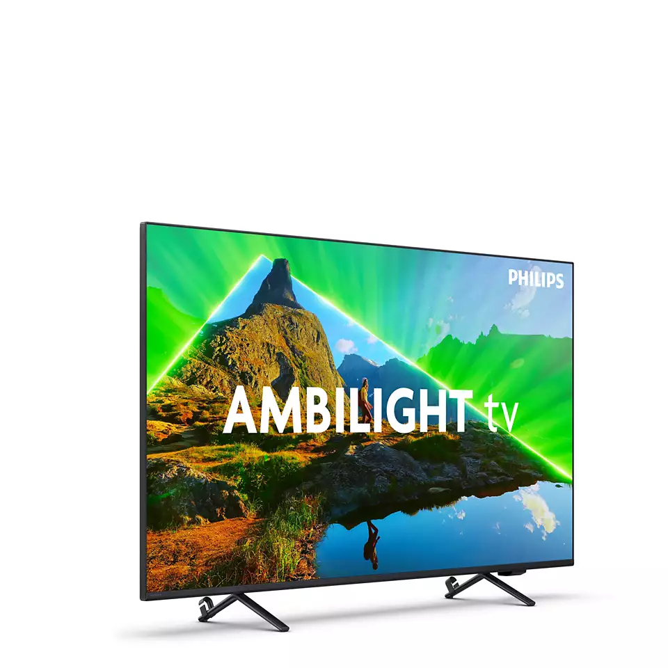 Ein Philips-Fernseher. Der Bildschirm zeigt eine Berglandschaft mit Ambilight-Effekt.