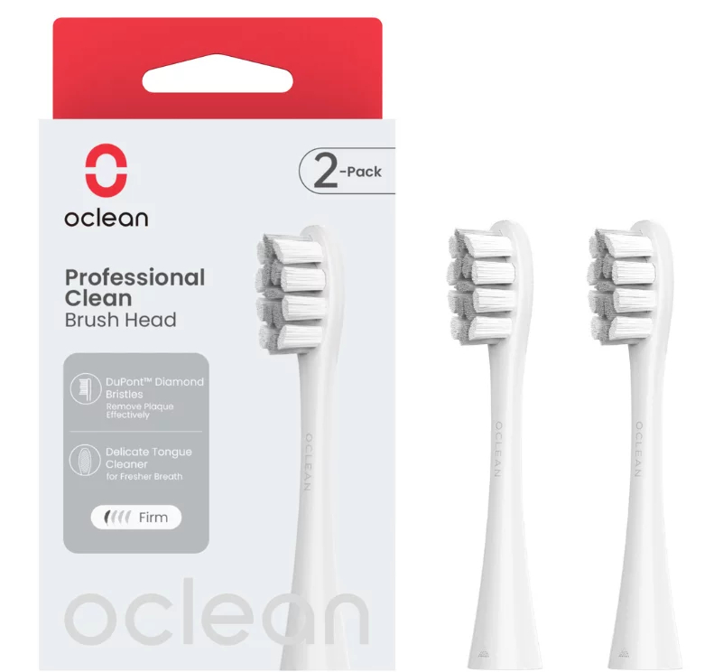 Dwa opakowania białych główek do szczoteczki do zębów, z etykietami tekstowymi na pudełku.