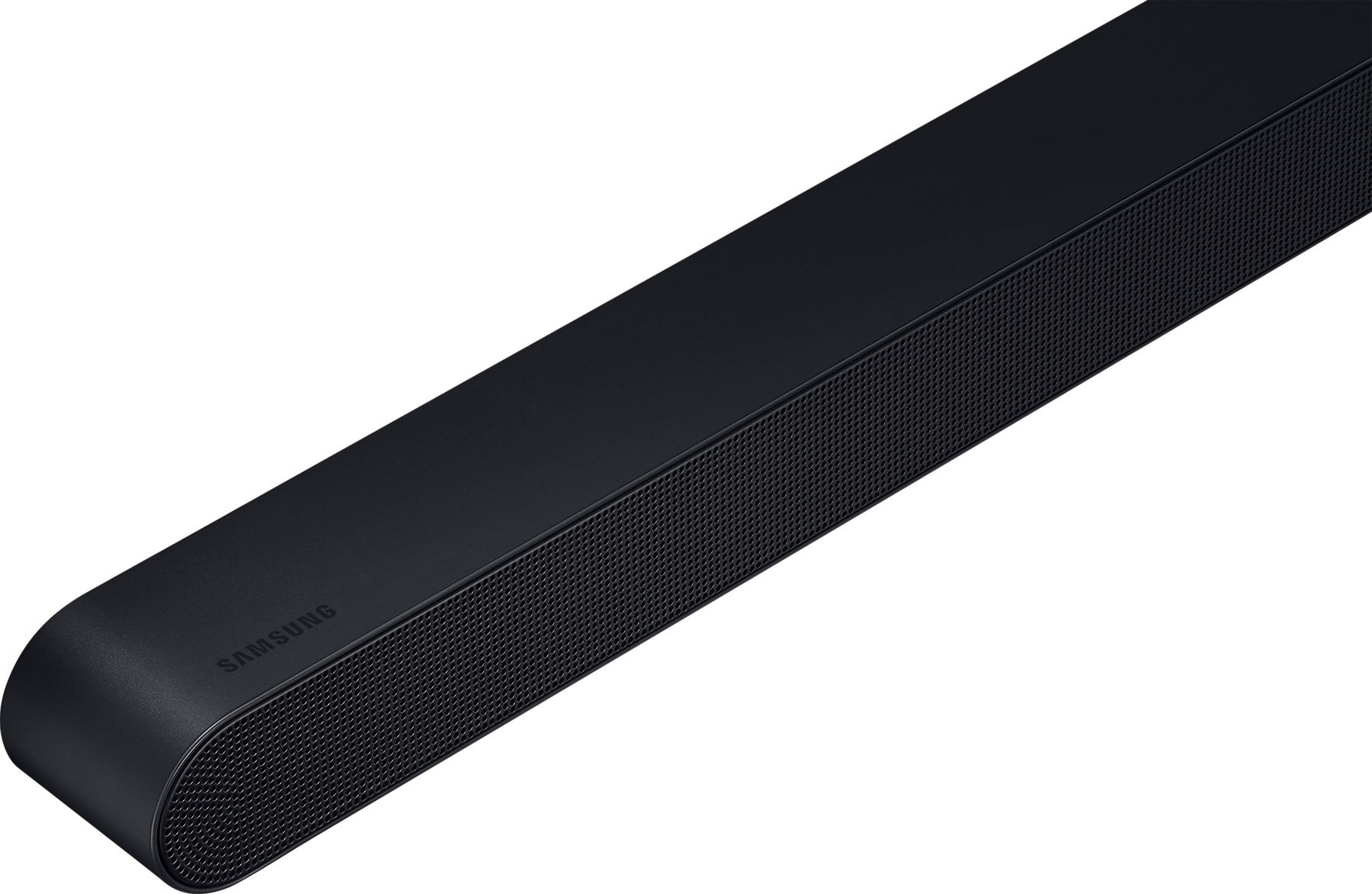 Barre de son Samsung noire sur fond noir. Texte 'SAMSUNG' visible.