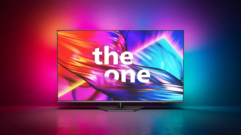 Ekran telewizora wyświetlający kolorowy obraz abstrakcyjny z tekstem 'the one'.