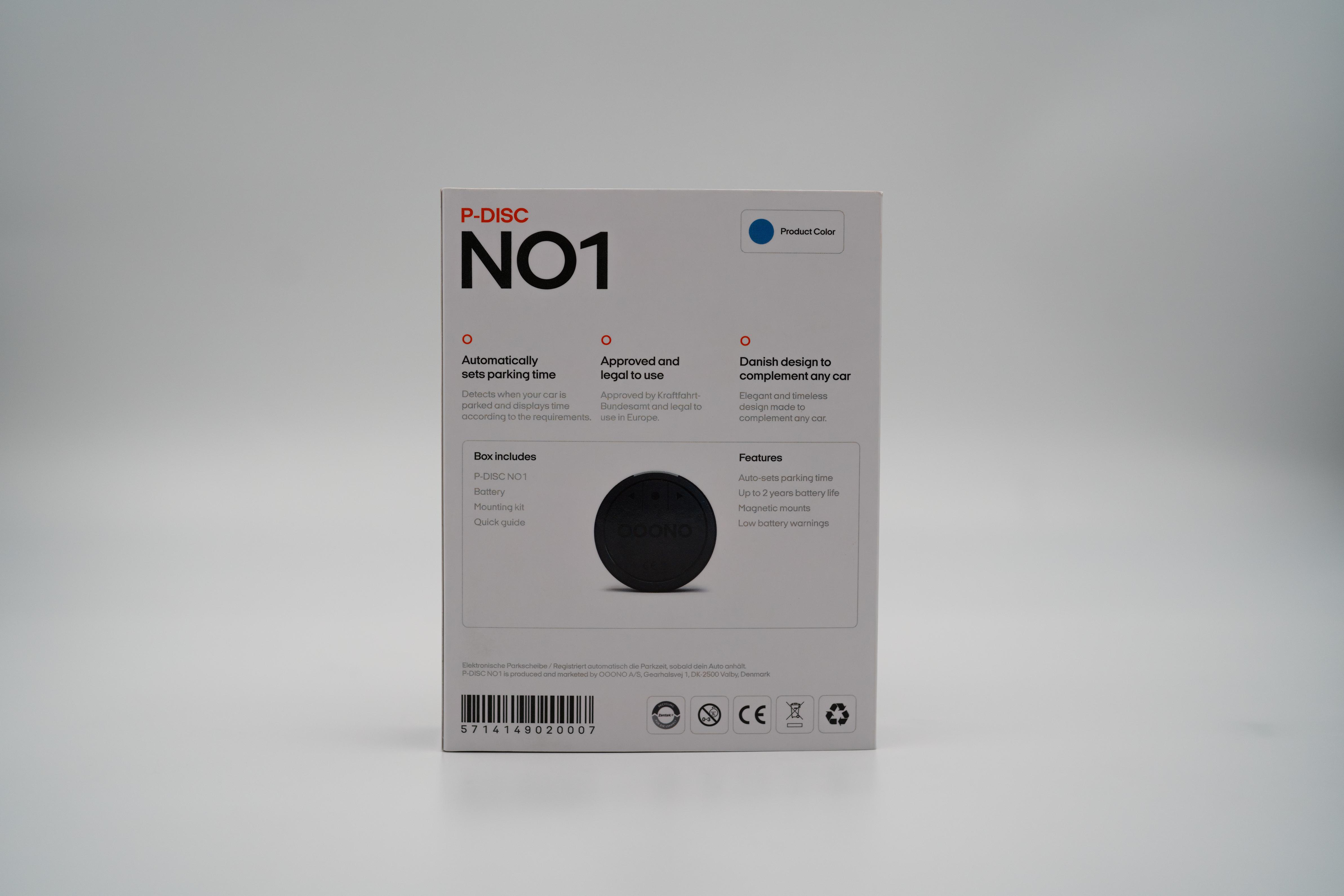 Eine weiße Box mit Produktetikett und blauen Farbakzenten, für das P-Disc Parkgerät.