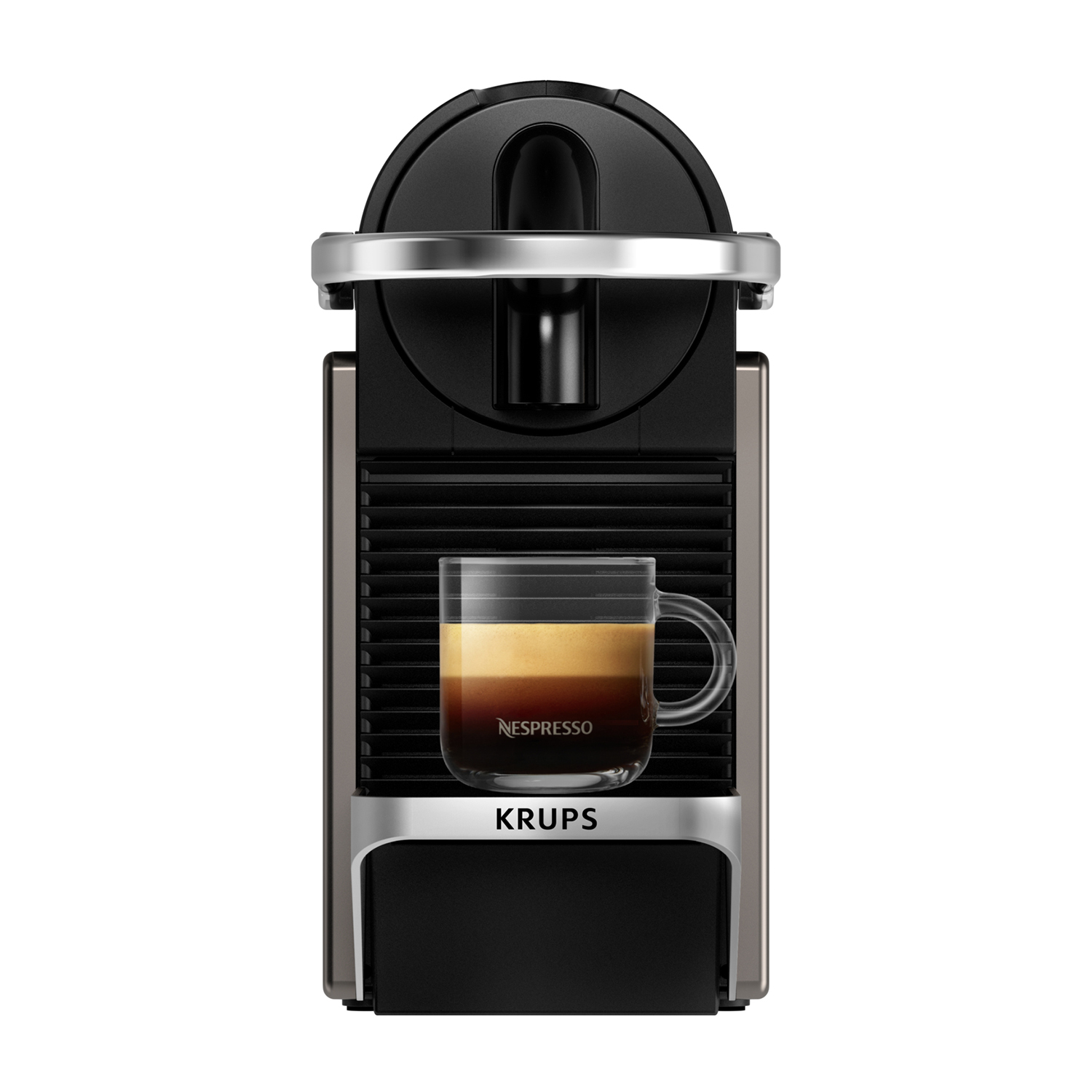 Macchina da caffè Nespresso con una tazza di caffè in vetro. La macchina è argentata e nera.