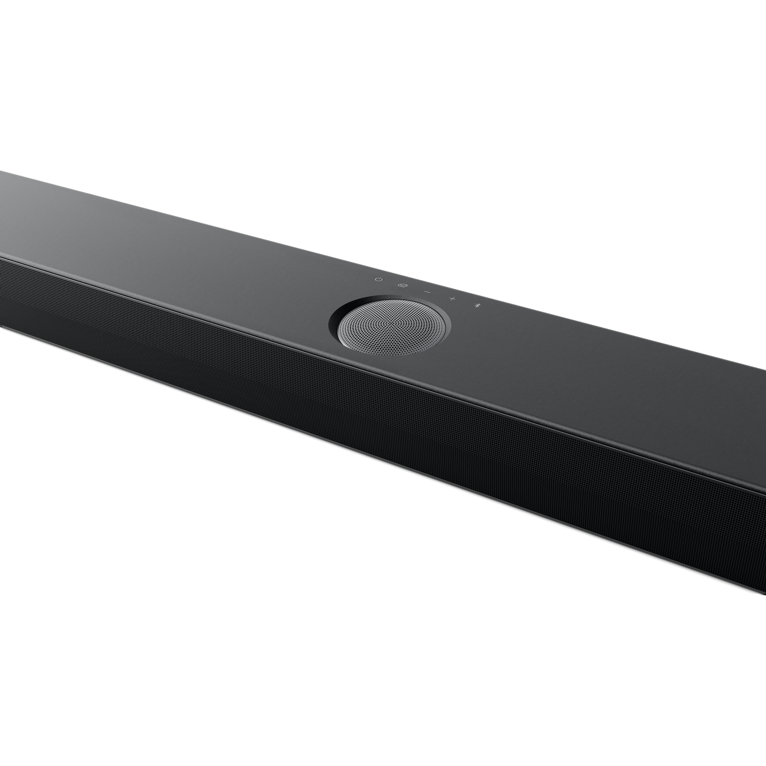 A long, black soundbar with a mesh grill and a circular control panel on top.