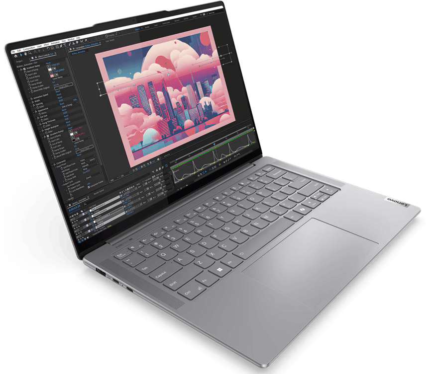 Ezüst laptop nyitva, videószerkesztő felület látható. Billentyűzet látható. Fekete háttér.