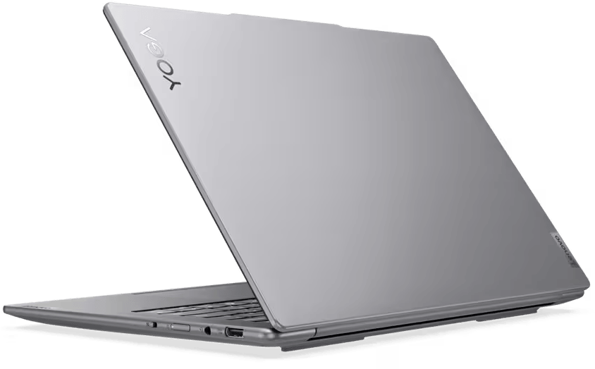 Egy ezüst Lenovo Yoga laptop, hátulról, kissé nyitva. A 'YOGA' logó látható.