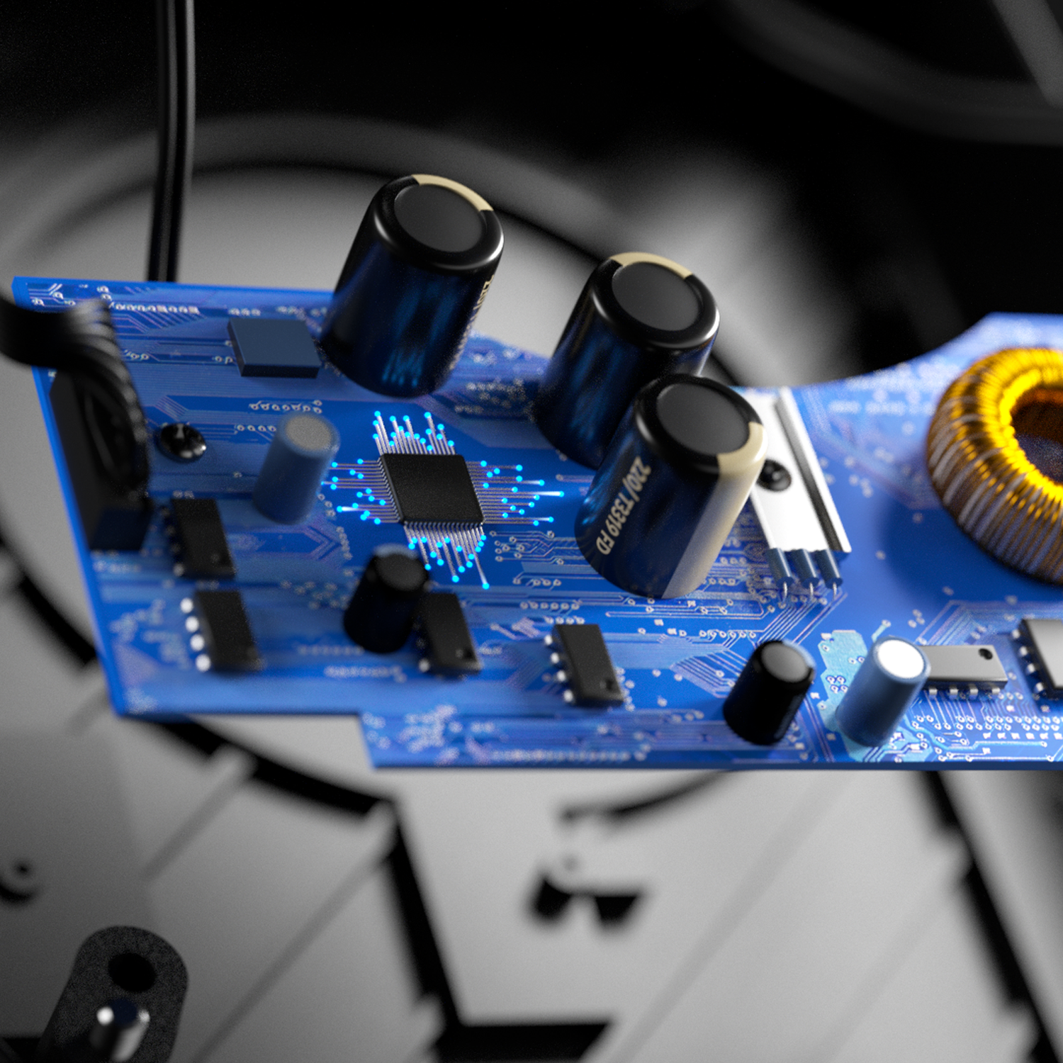 Close-up van een printplaat met condensatoren en andere elektronische componenten. Blauw en zwart.