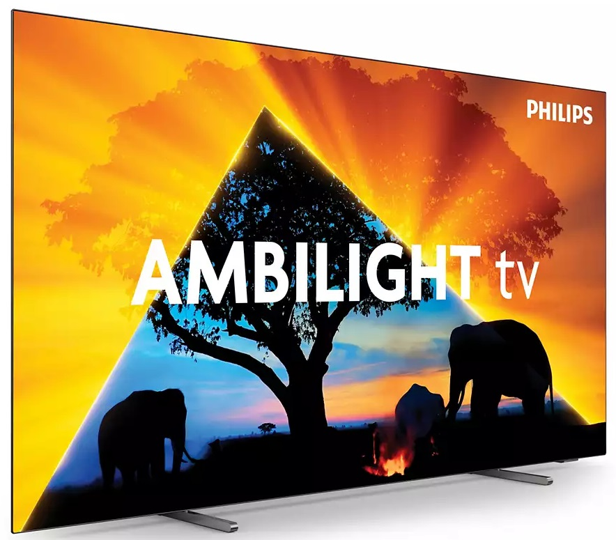 Duży telewizor Philips Ambilight z zachodem słońca, słoniami i sylwetką drzewa.