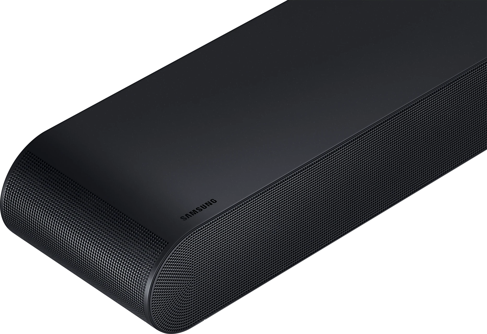 Barre de son noire. L'avant a une texture en mesh et le logo Samsung. Fond noir.