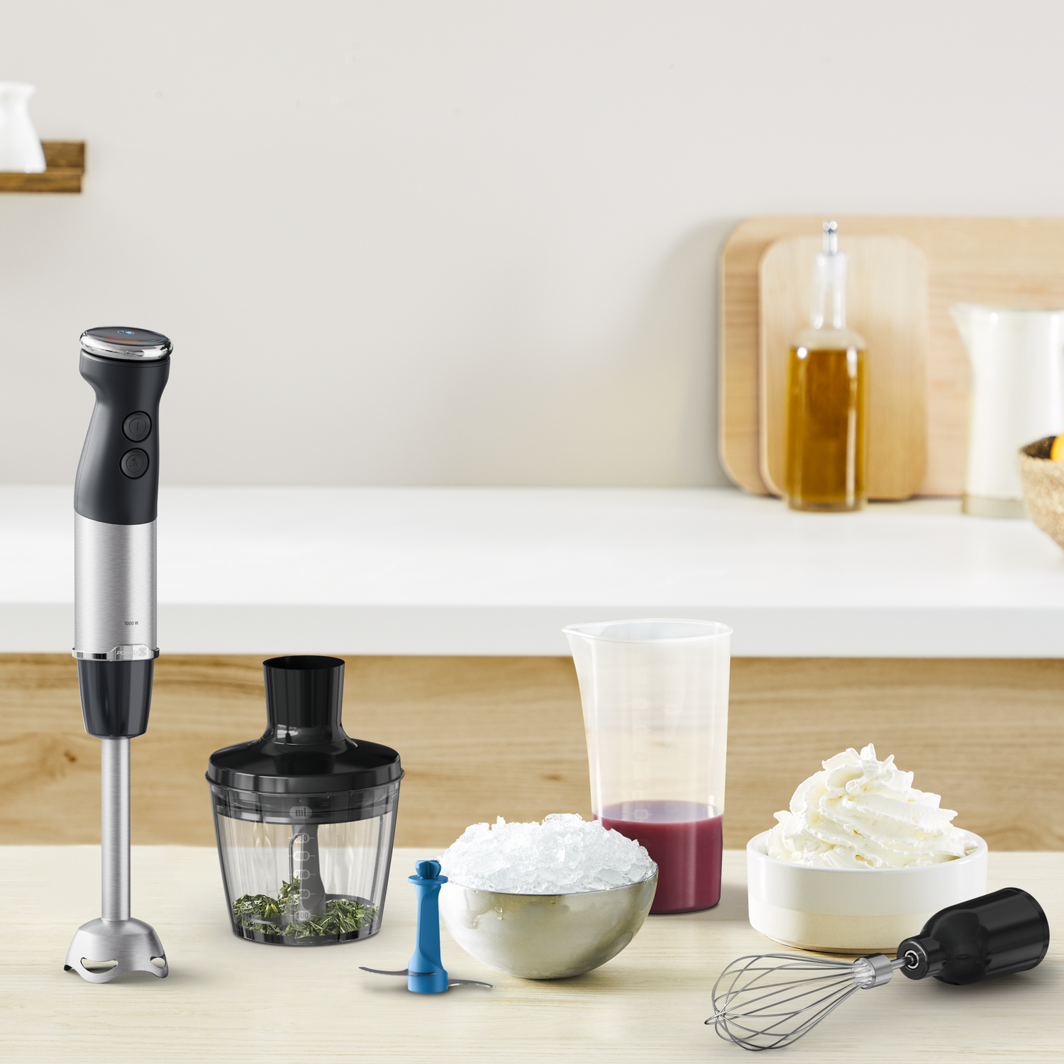 Blender with attachments, ingredients, and whipped cream on a counter.